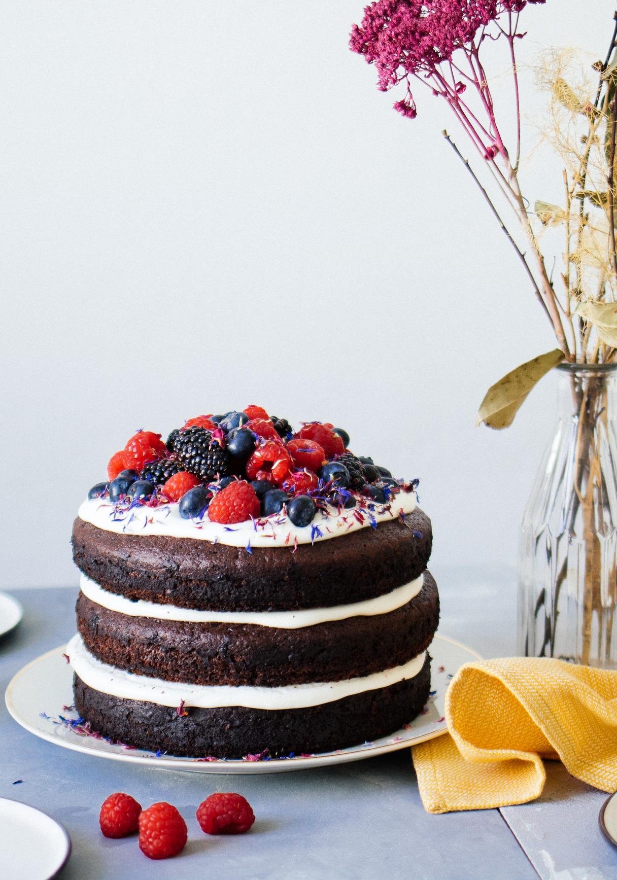 Simple, vegan chocolate cake with berries