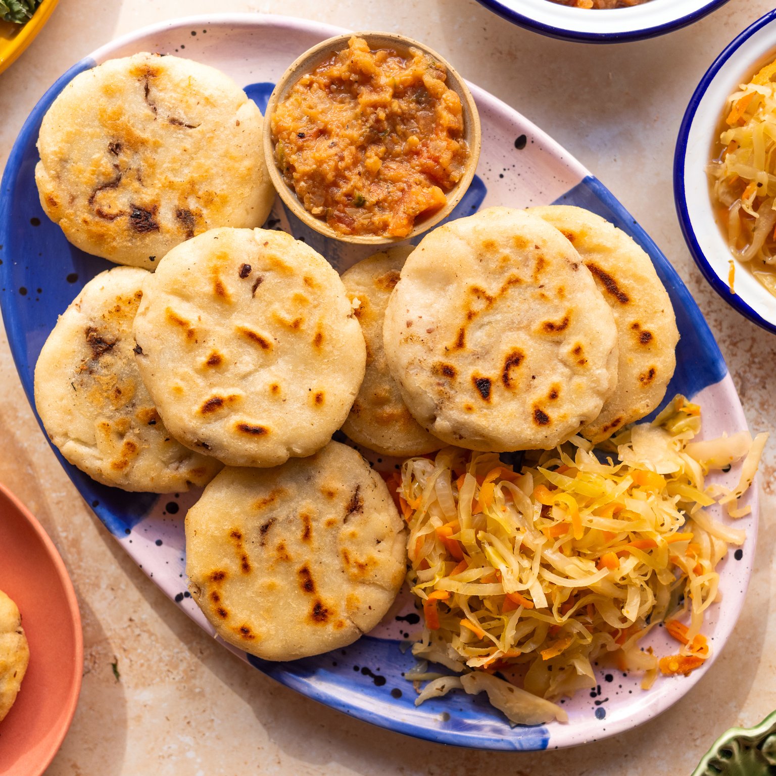 Vegan Pupusas (Stuffed Flatbreads) with Beans and Cheese Filling, Salsa Roja and Curtido