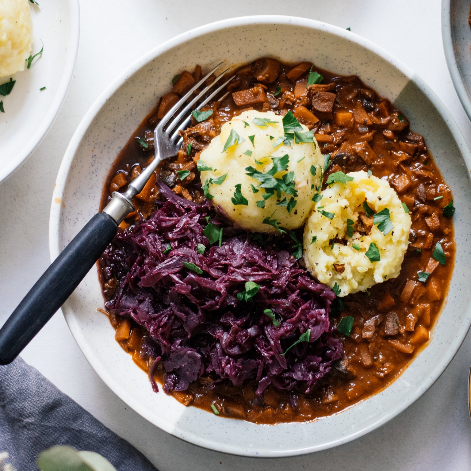 Vegan Potato Dumplings with Mushroom Ragout and Red Cabbage