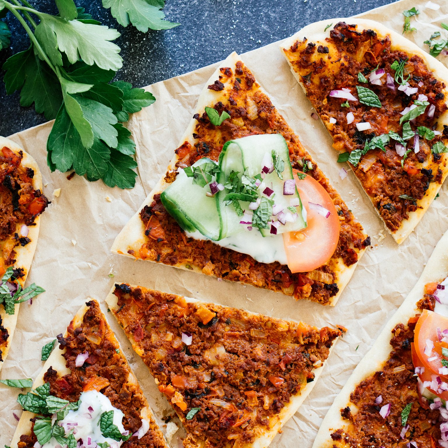 Vegan Lahmacun with herb yogurt sauce