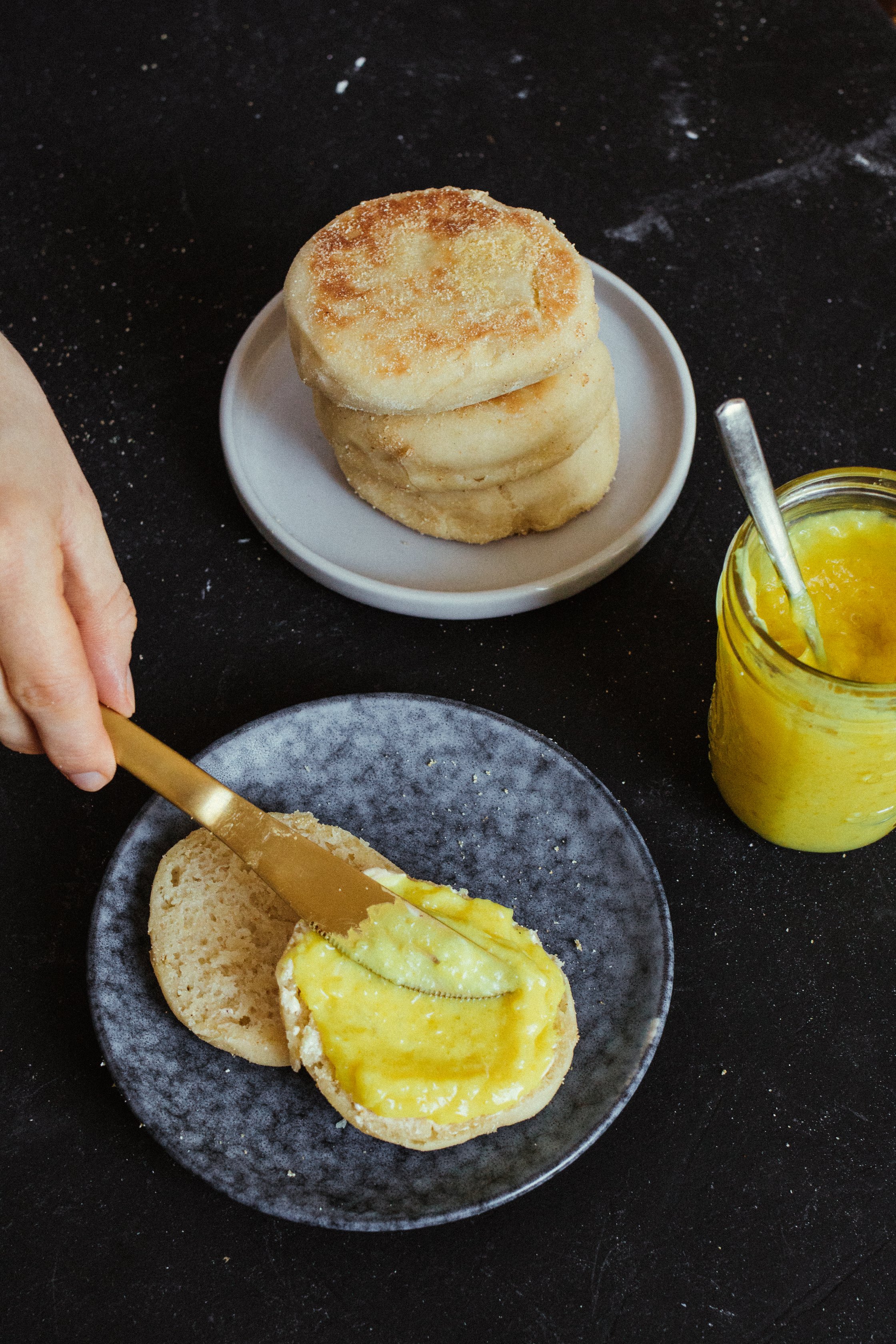 lemon curd gets spread on english muffins