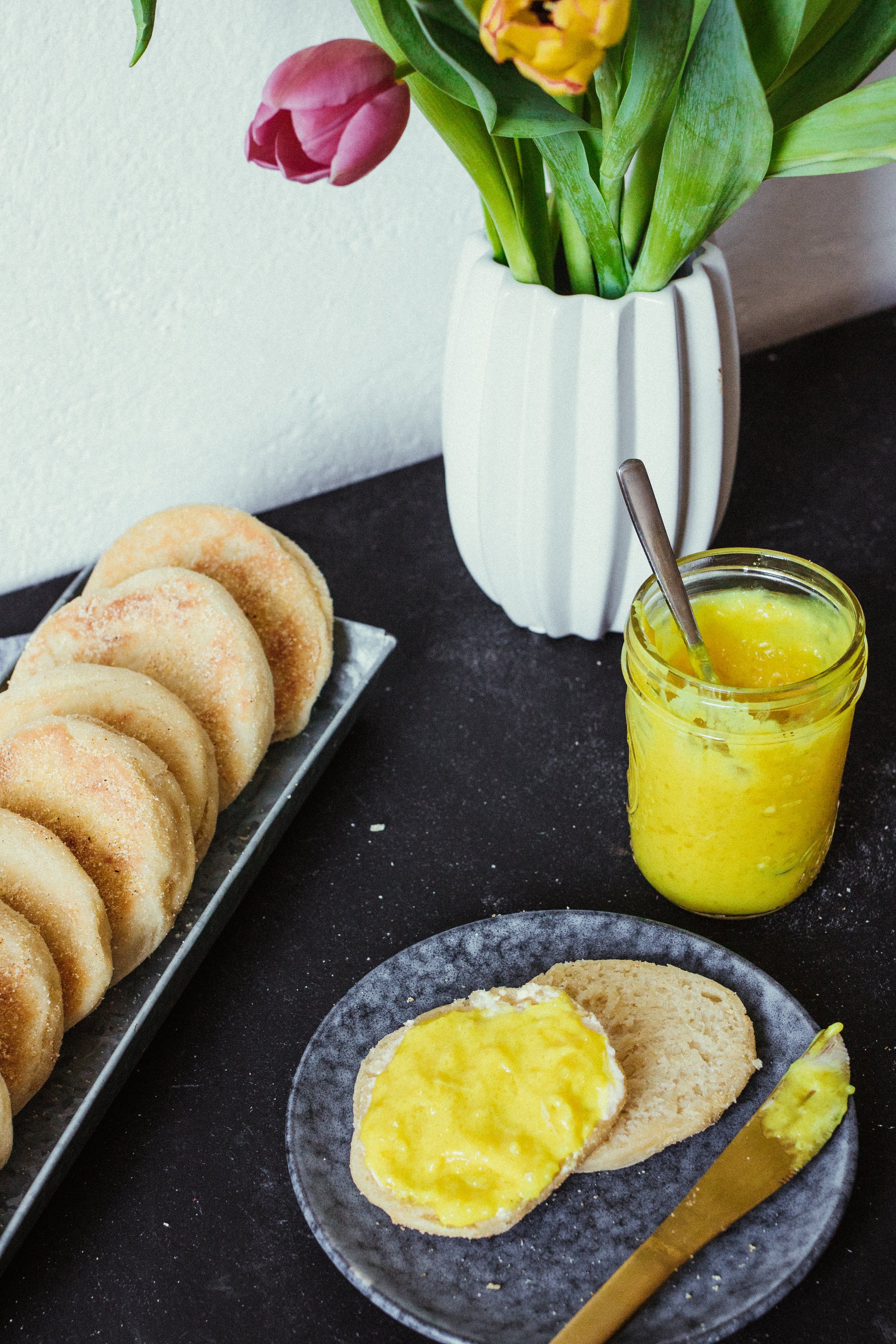 english muffins with lemon curd on a plate
