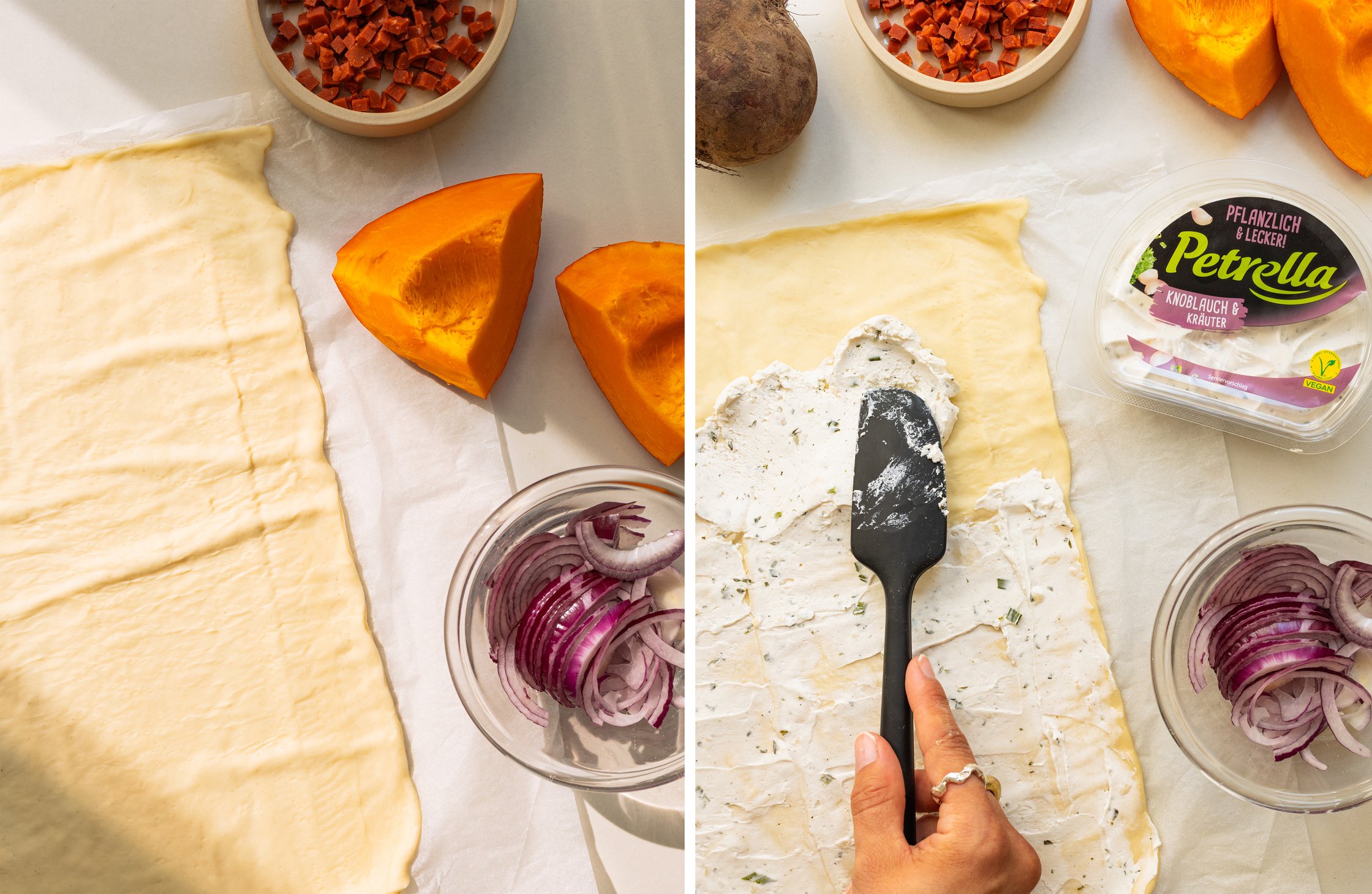 Rolled-out tarte flambée base being brushed with vegan Petrella crème and ingredients nearby.