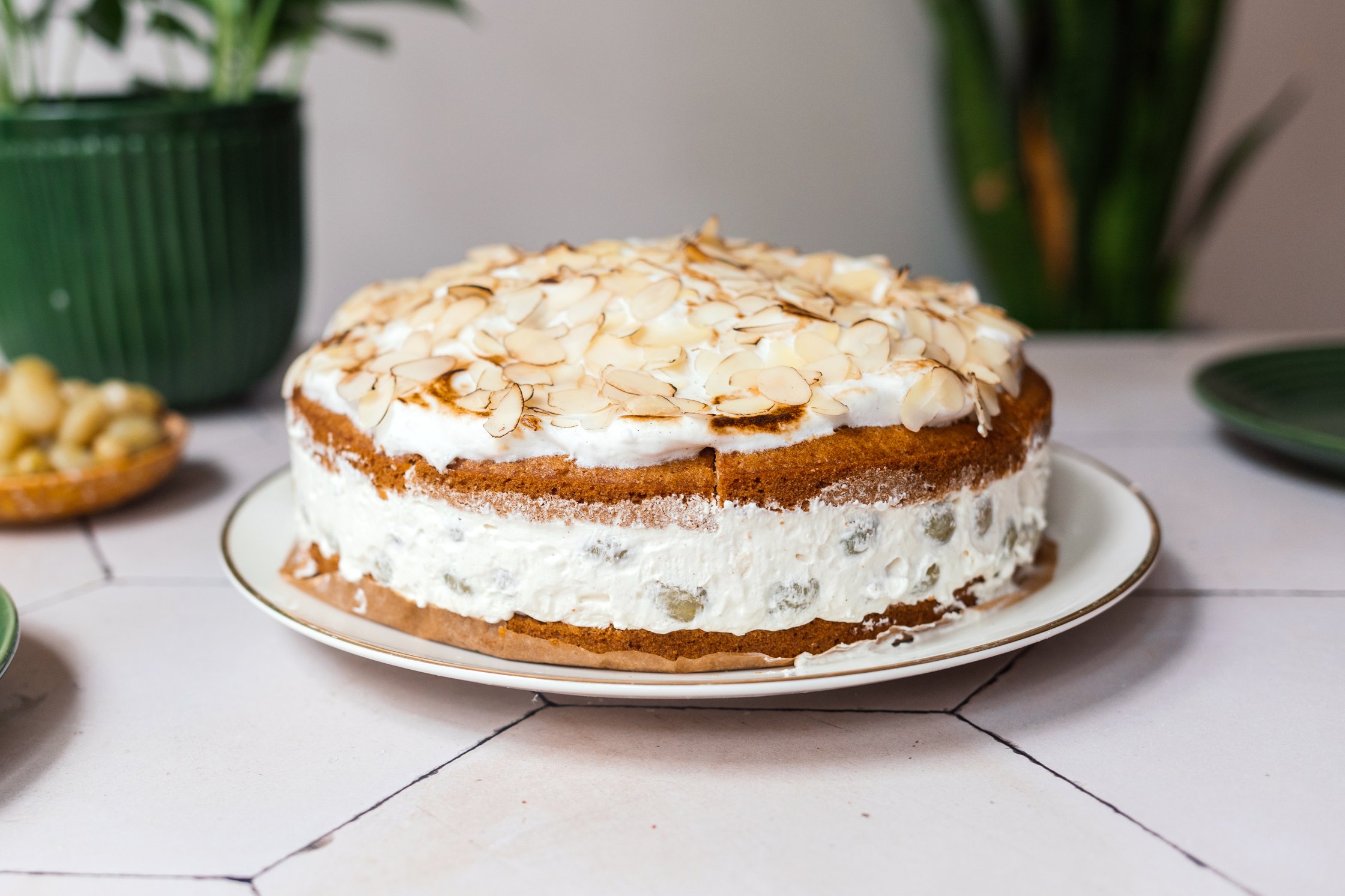 Vegan Gooseberry Meringue Cake served on a table