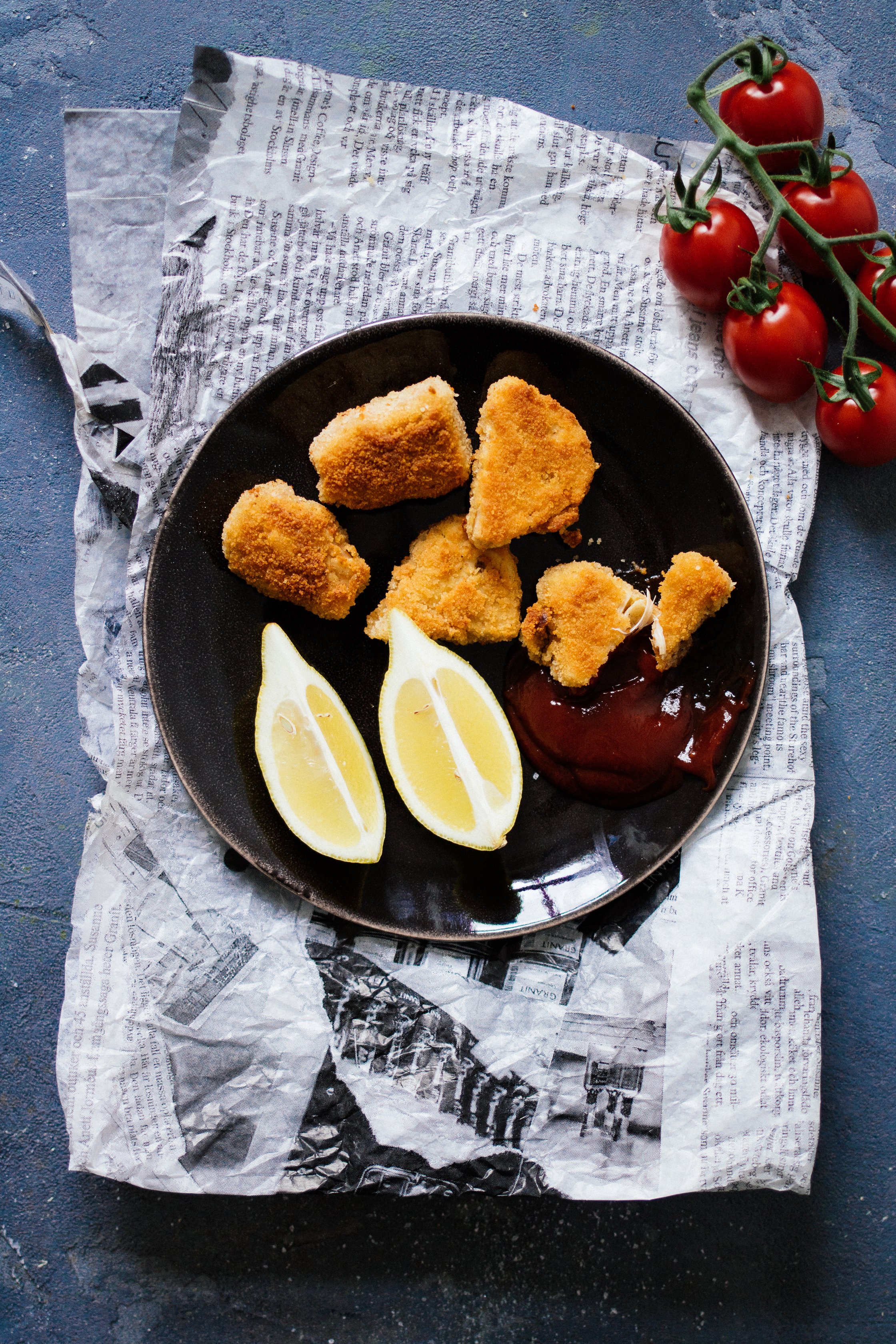 nuggets on a black plate