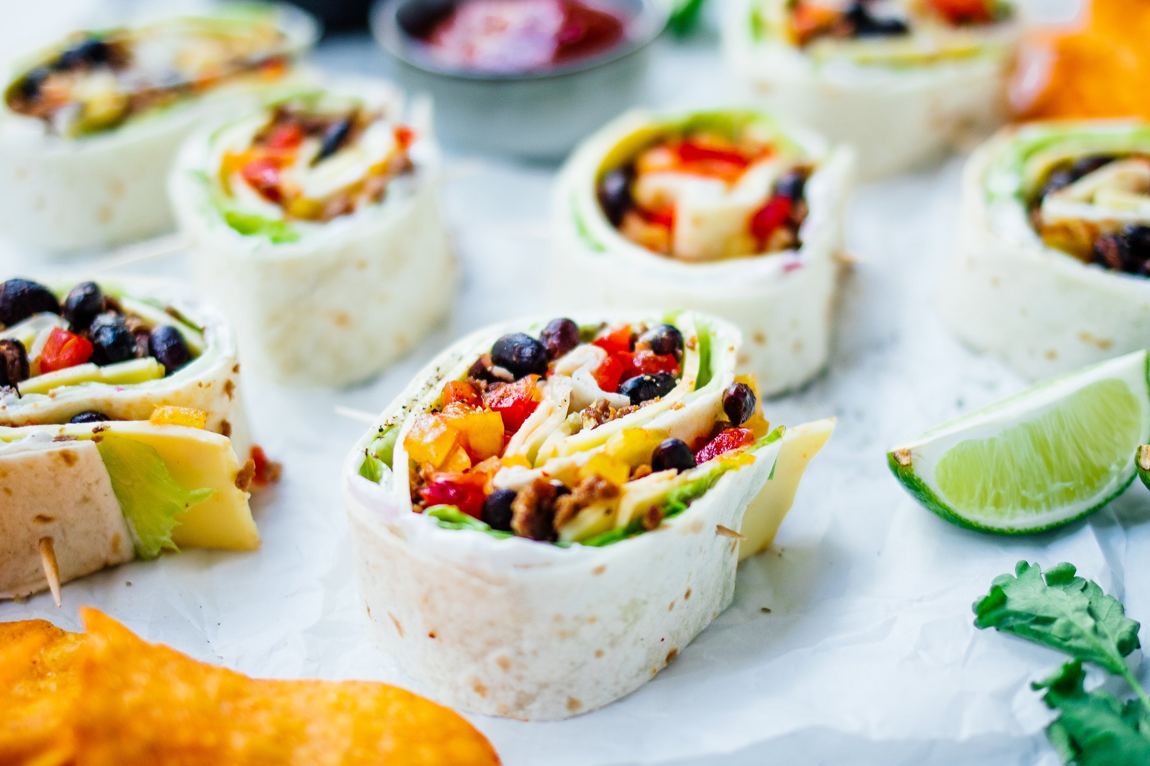 vegan tortilla pinwheels with beans and salad