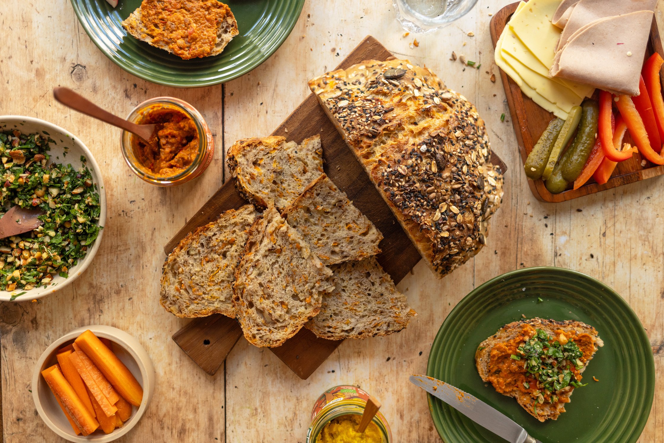 No Knead Bread With Carrots and Walnuts on the dinner table