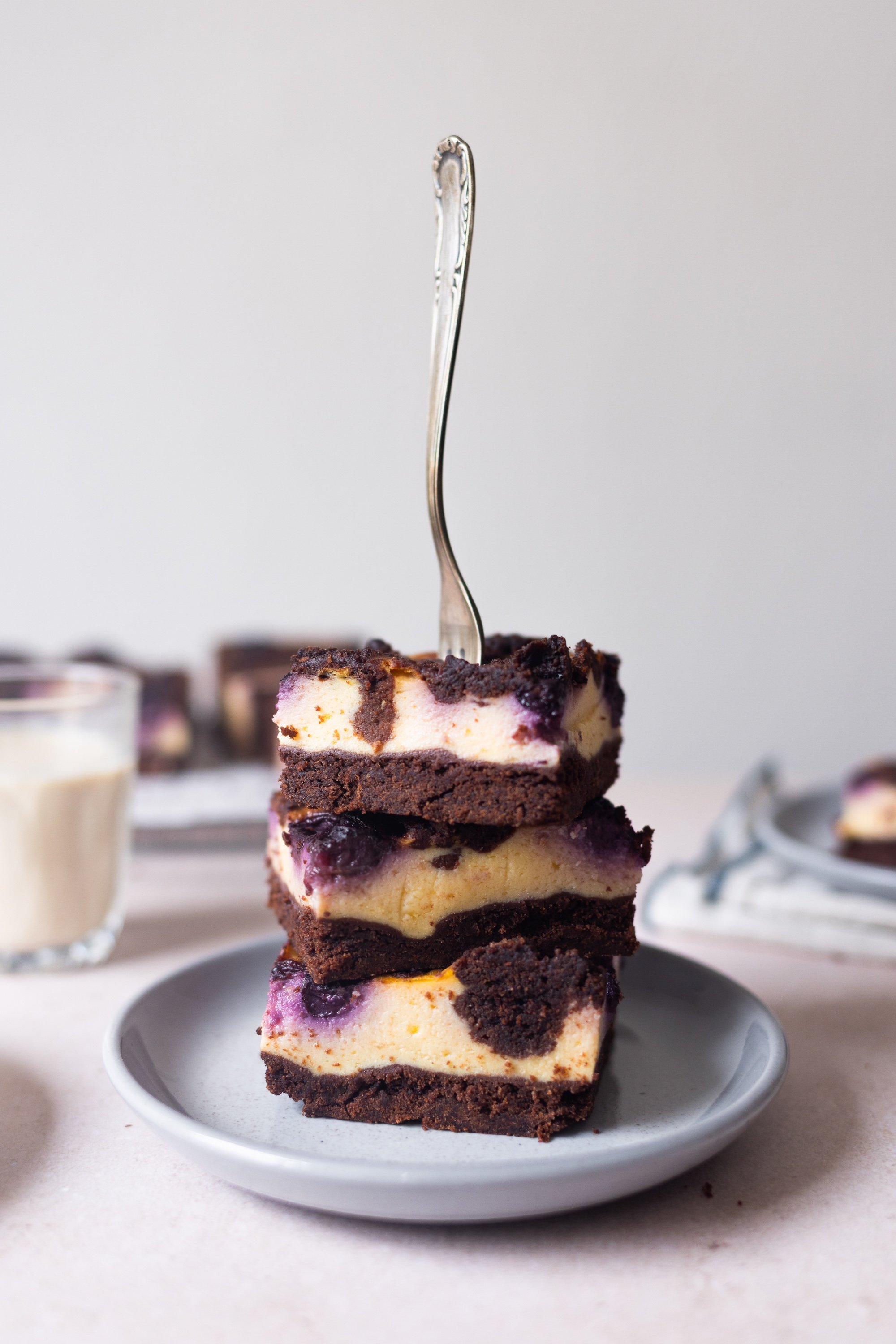 vegan blueberry cheesecake, stacked on a small plate