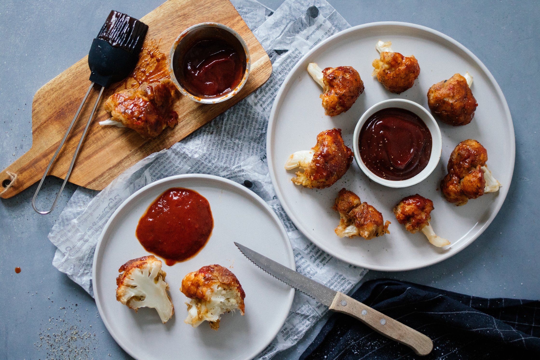 serving chicken wings on two plates