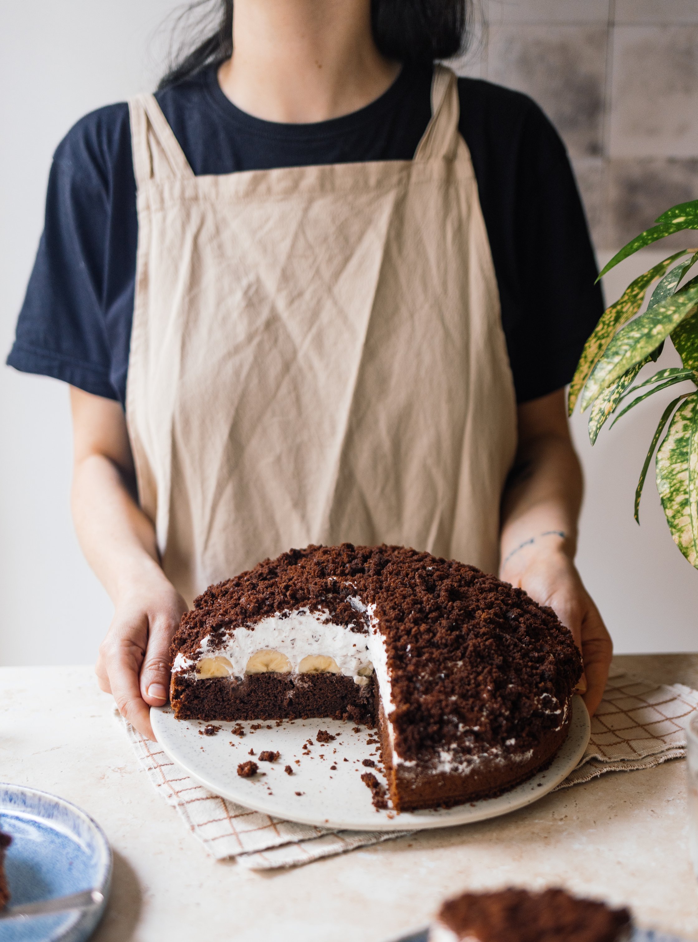 Julia holding a vegan mole cake