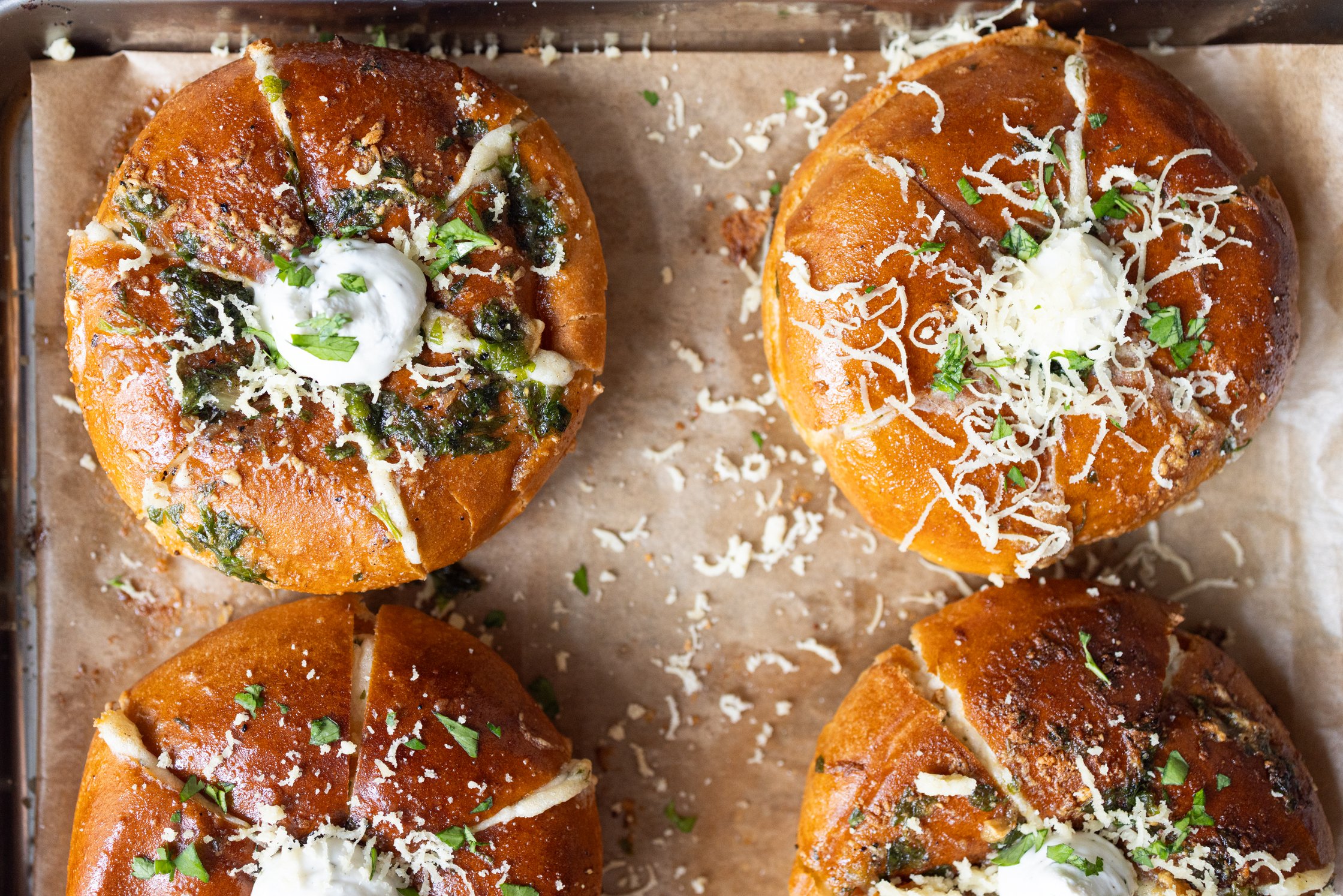 Filled cream cheese roll on a baking sheet