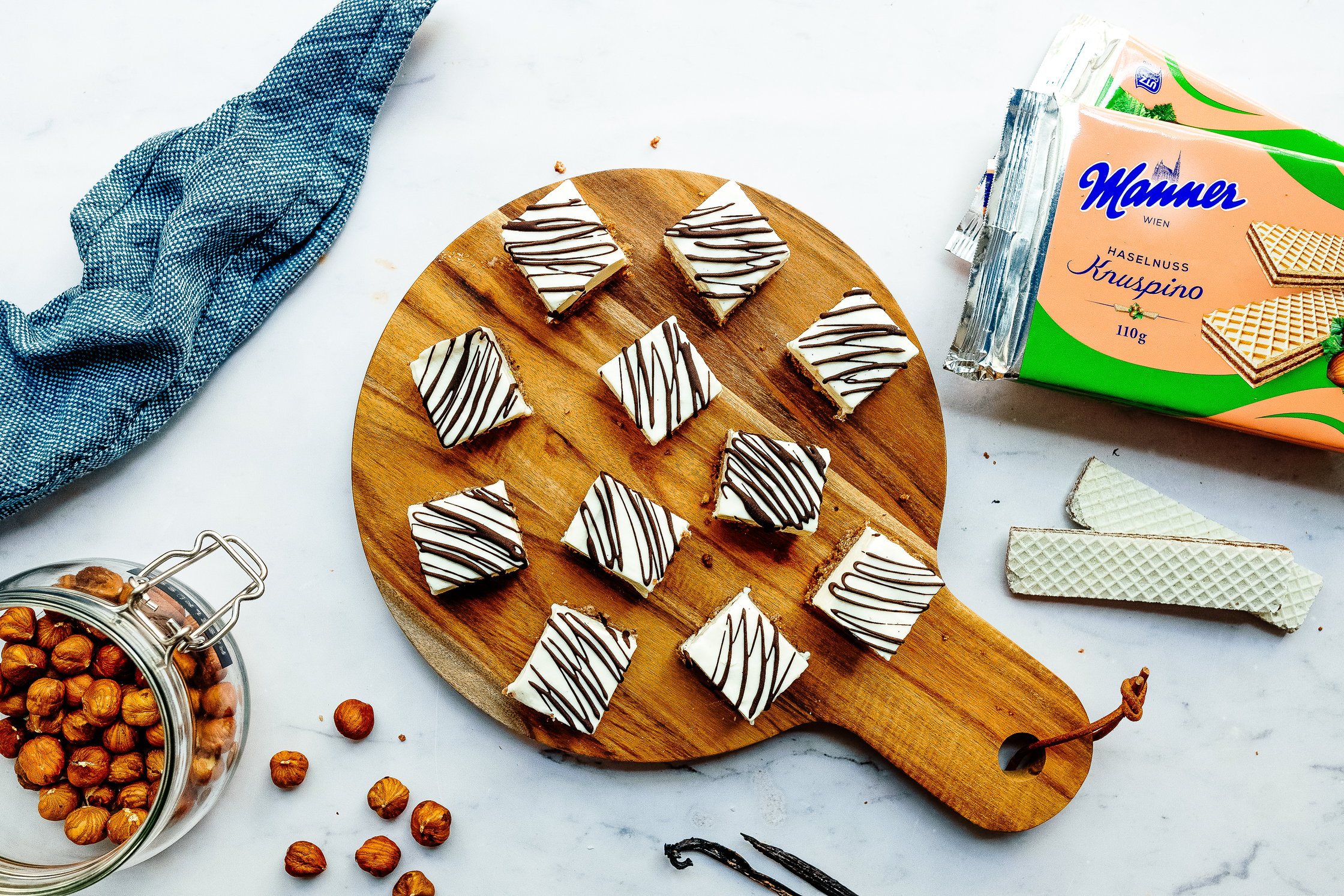 vegan cheesecake bites on a wooden board