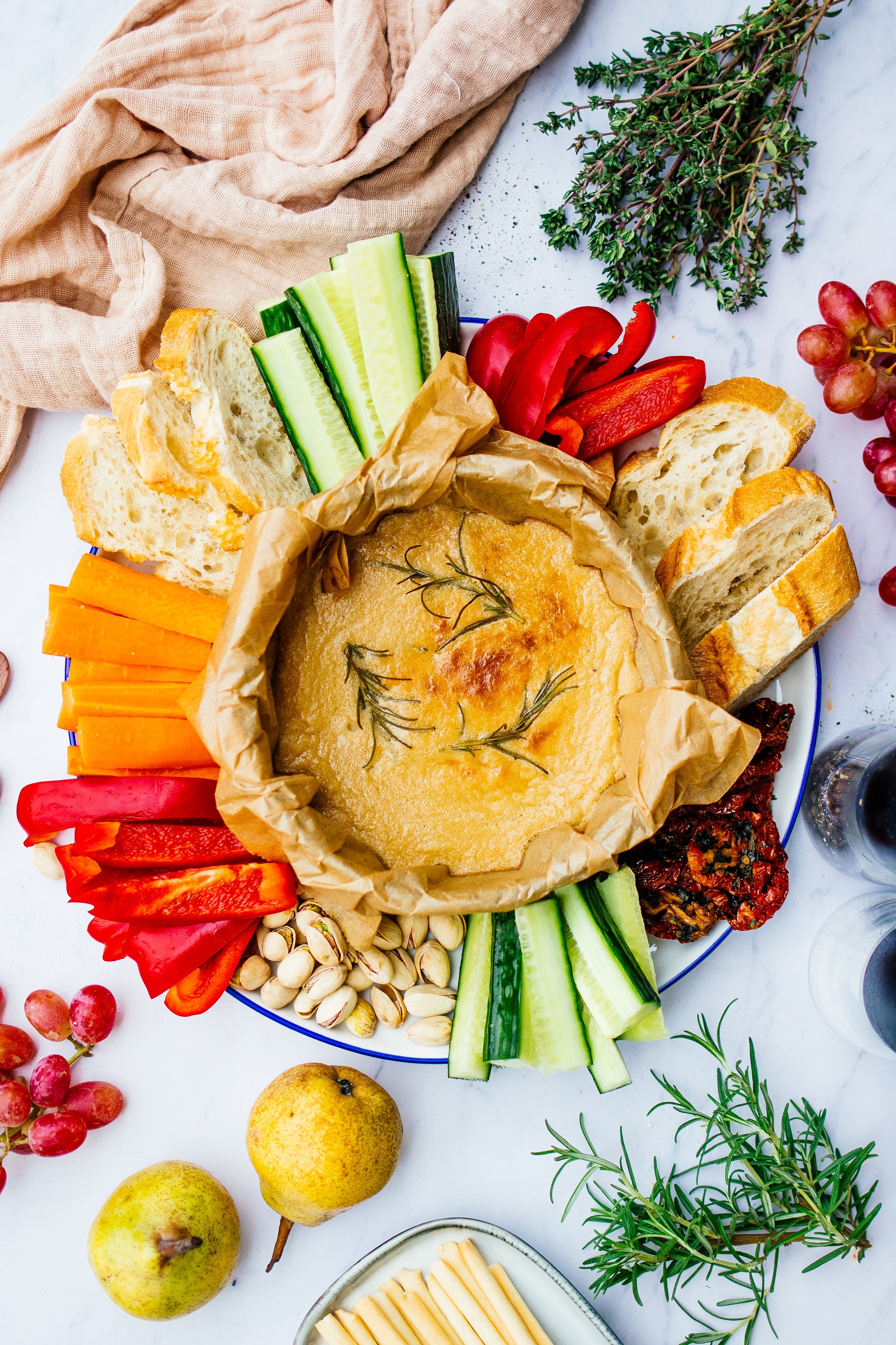 vegan oven-baked cheese with veggies and bread