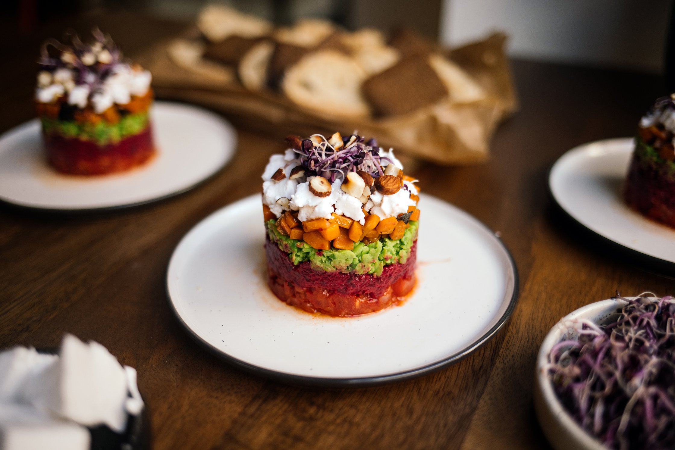Veggie Tartar with Beetroot, Tomatoes, Peas, and Carrot Lox on a plate