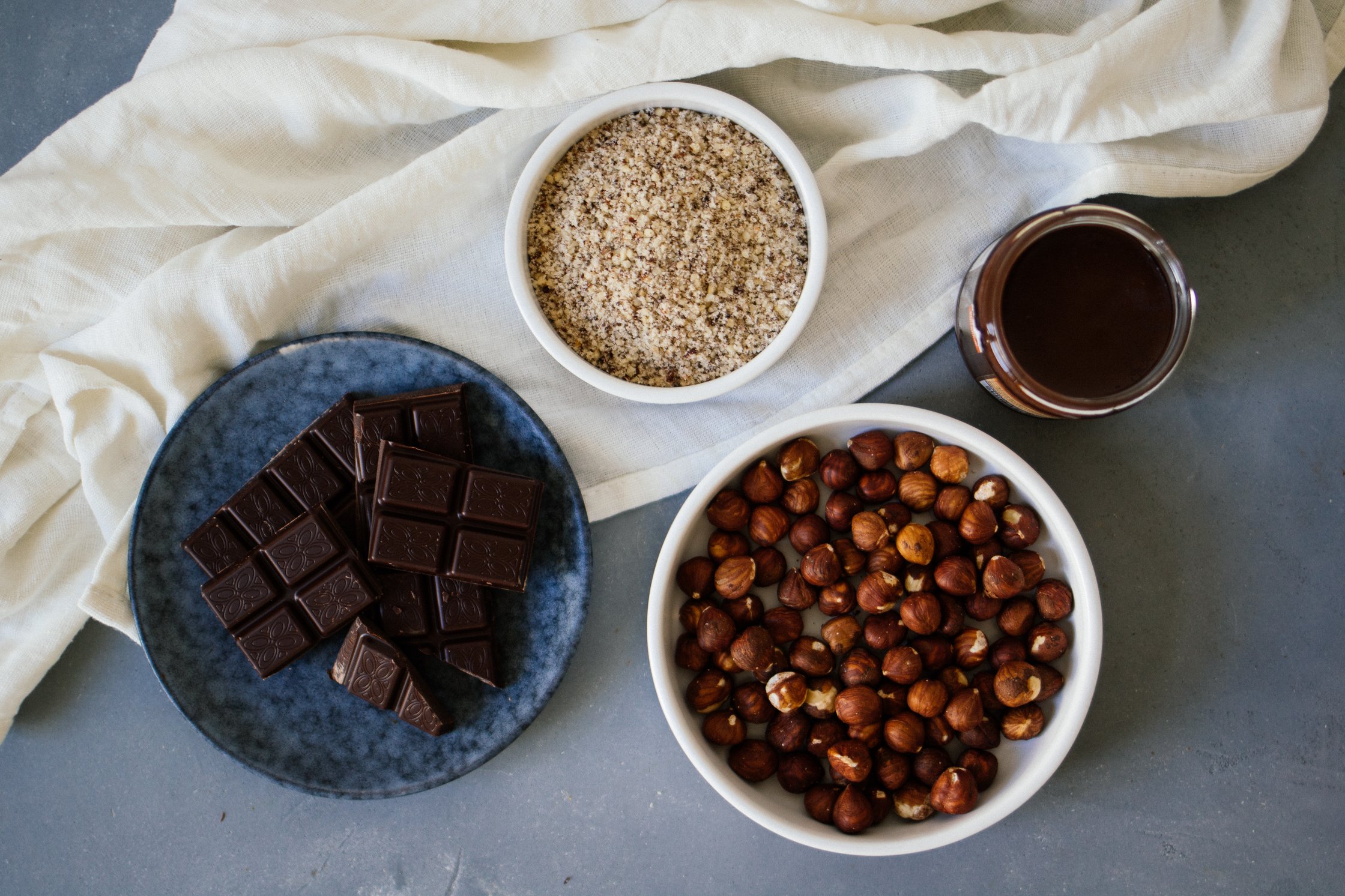 ingredients for vegan Rocher on a blue backdrop