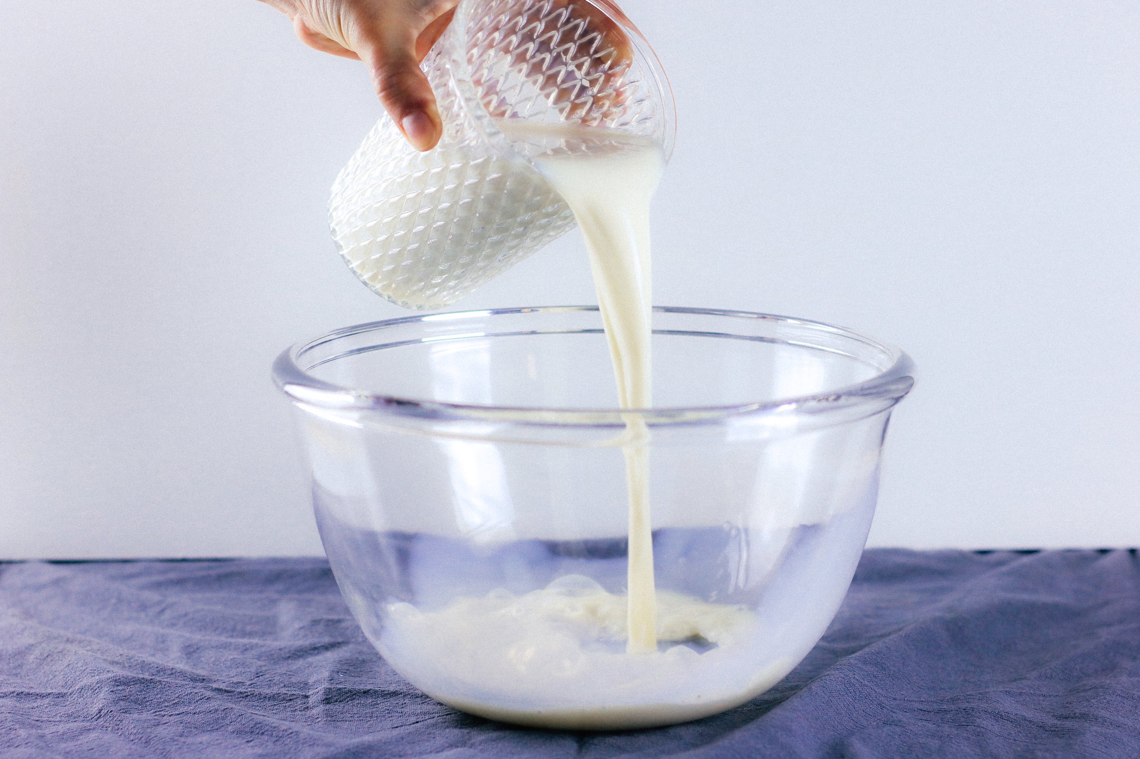 milk poured in a glass bowl
