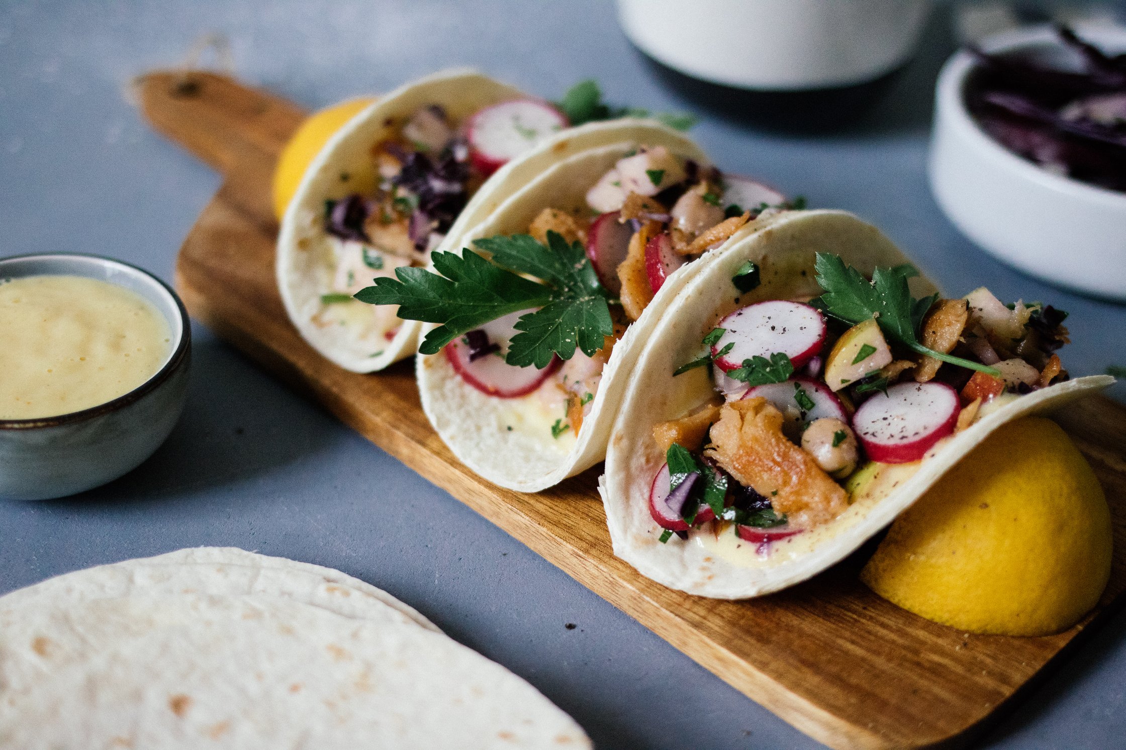 picnic tacos on a wooden board