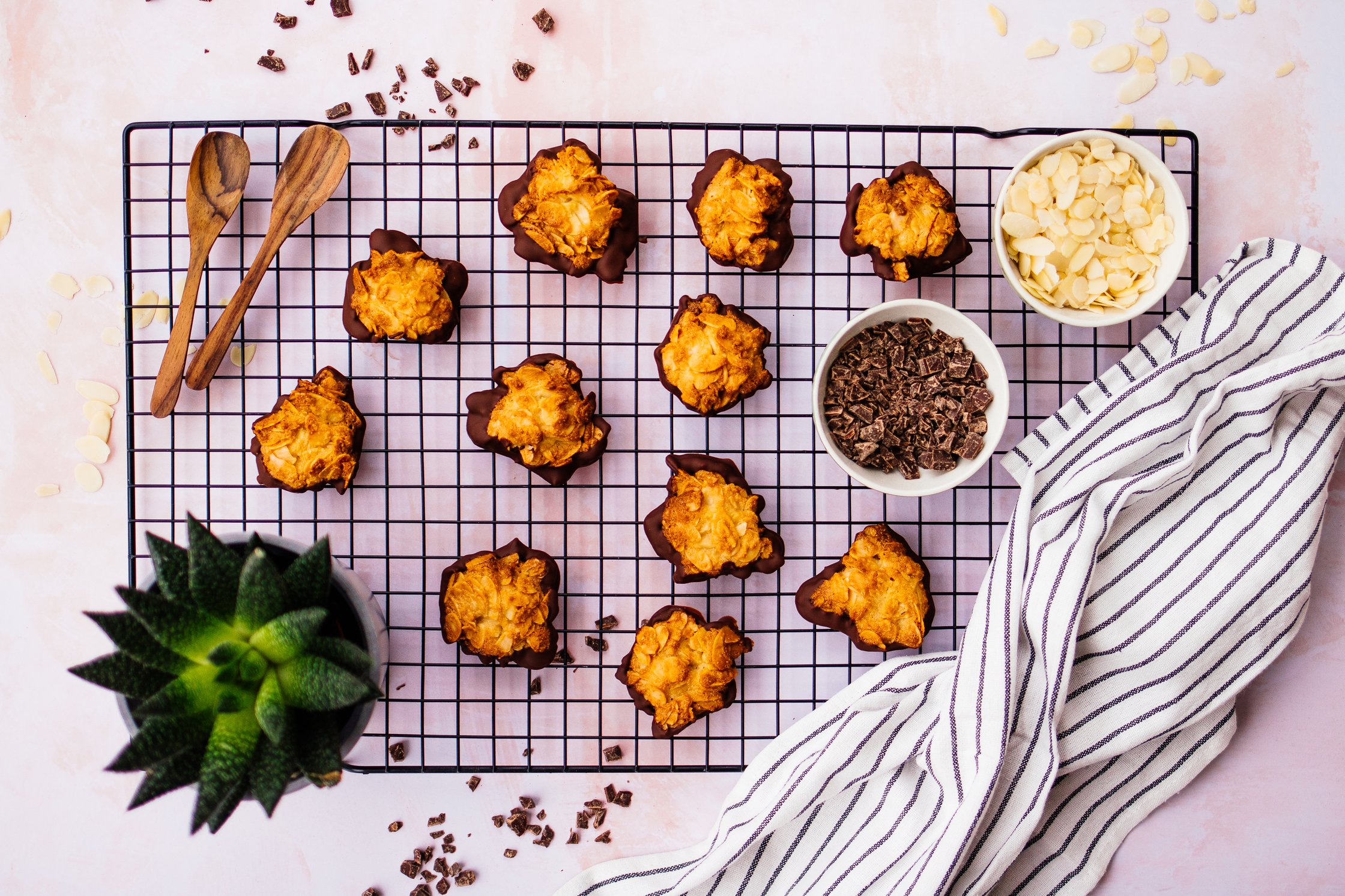 vegan florentines on a pink backdrop