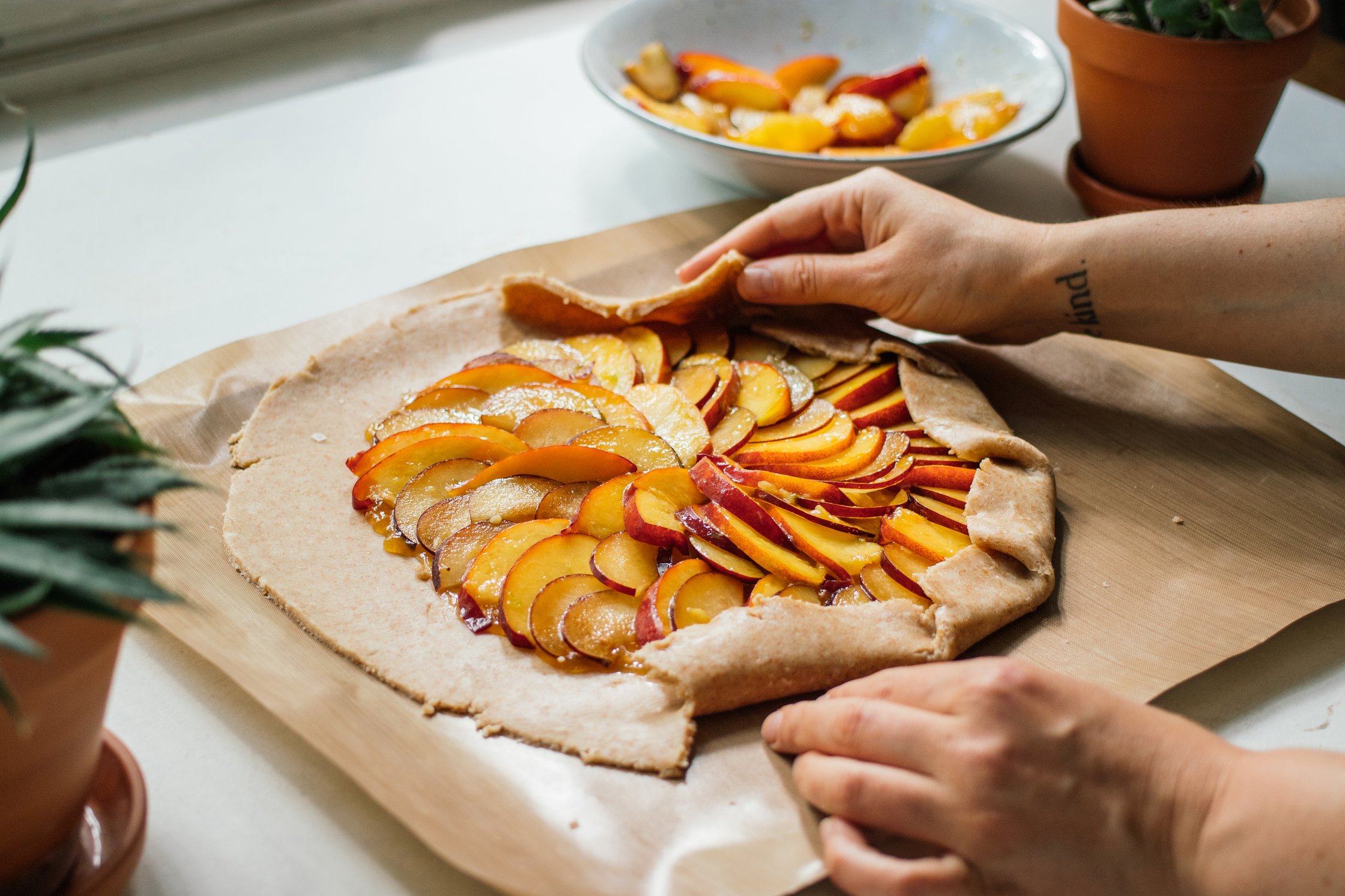 folding in edges of vegan galette