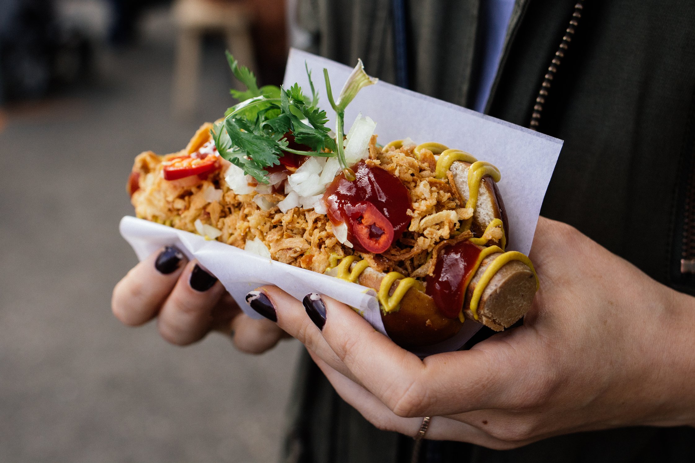 Julia holding Hot Dog