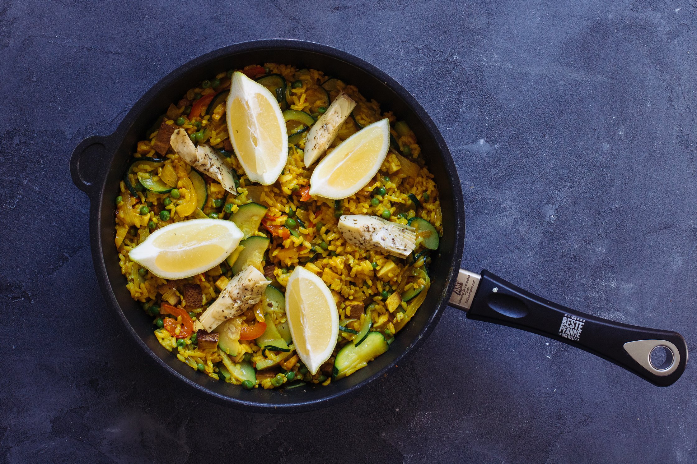 paella is ready, waiting in a pan