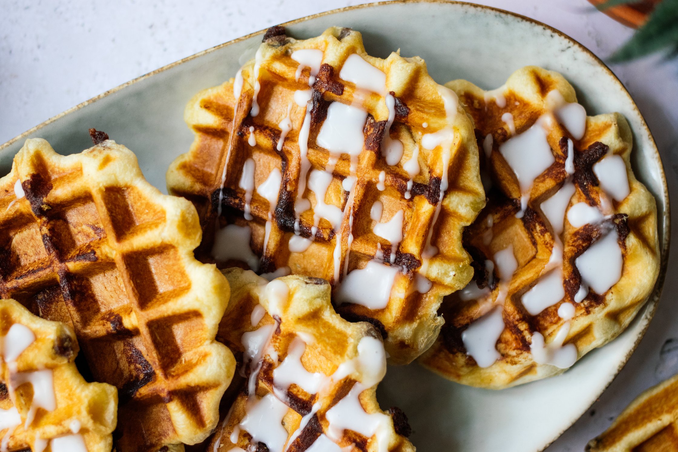 closeup of Vegan cinnamon roll waffles