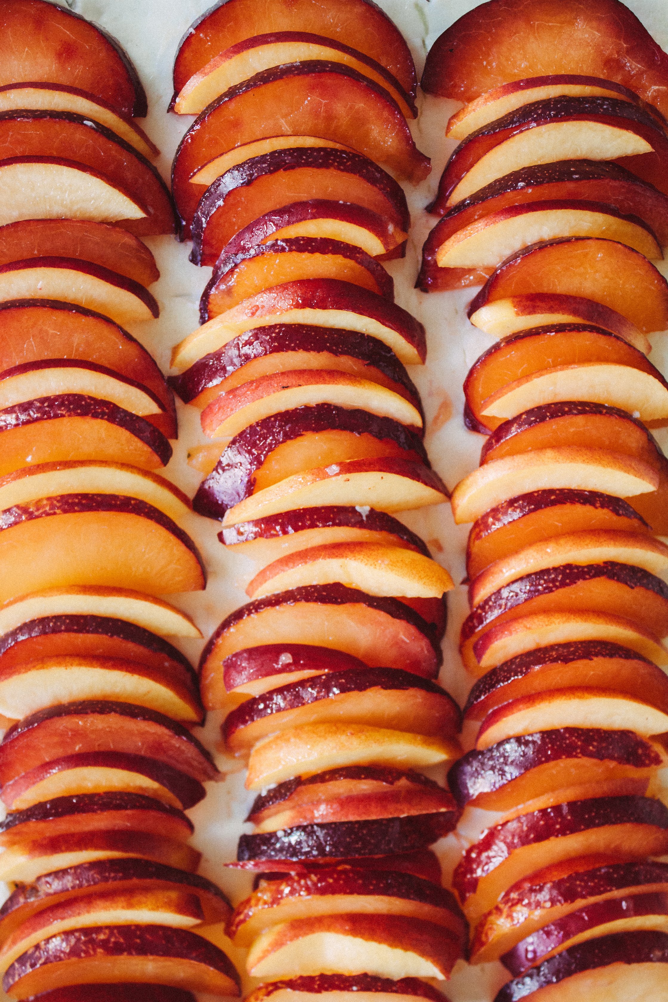 sliced peach on cake