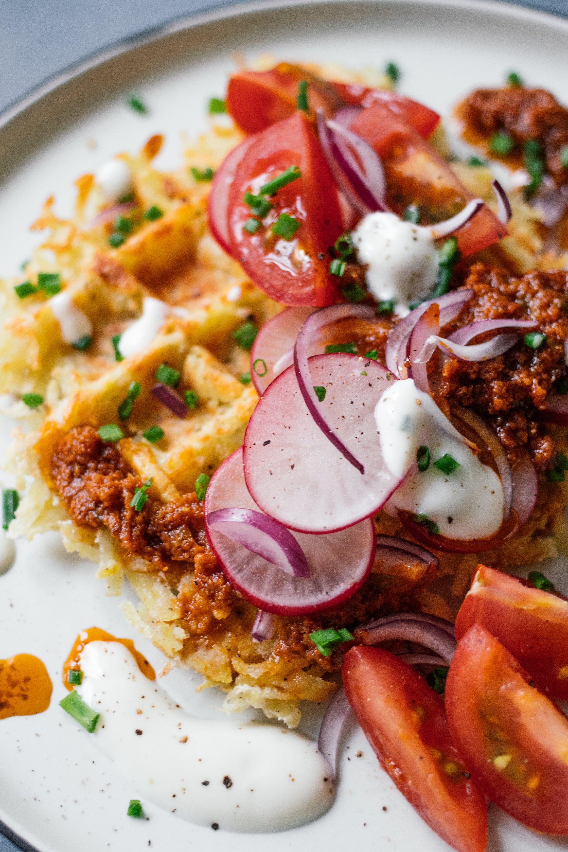vegan savory potato waffles with tomatoes