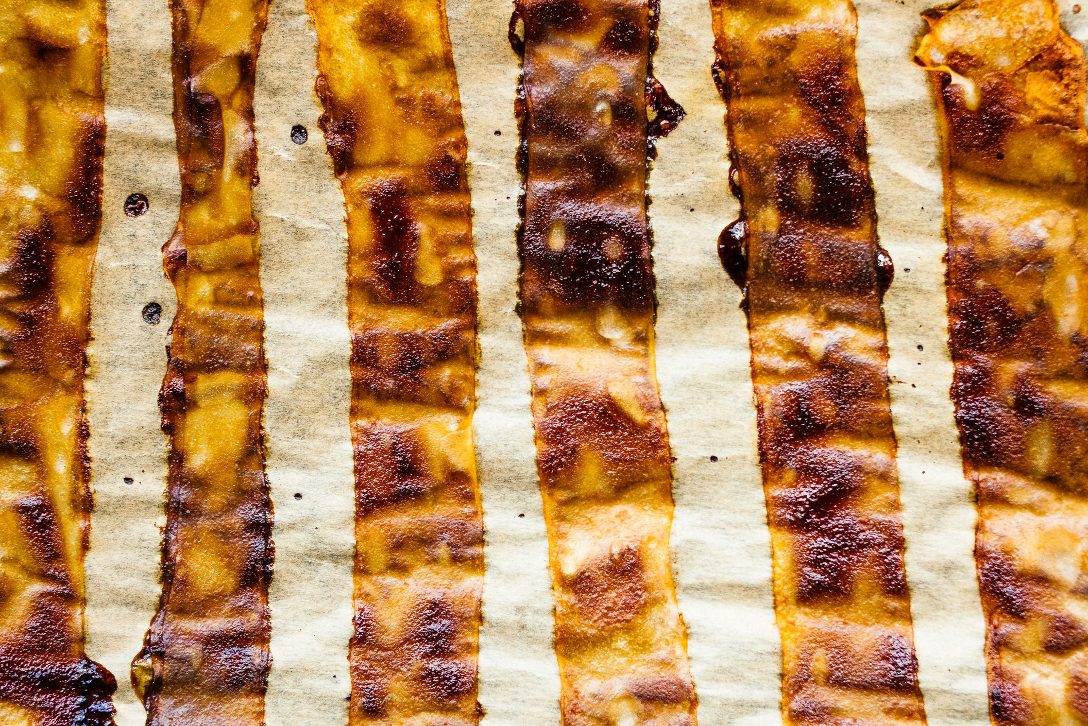 vegan bacon slices on a baking tray