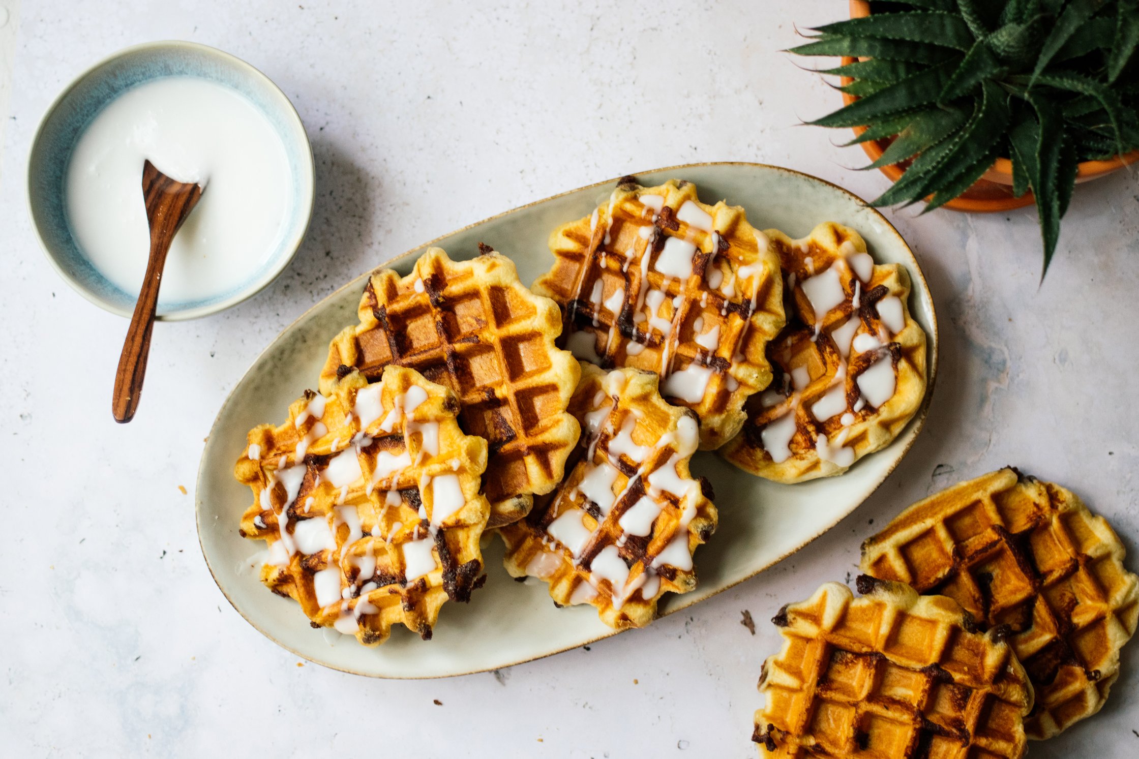 Vegan cinnamon roll waffles on the table