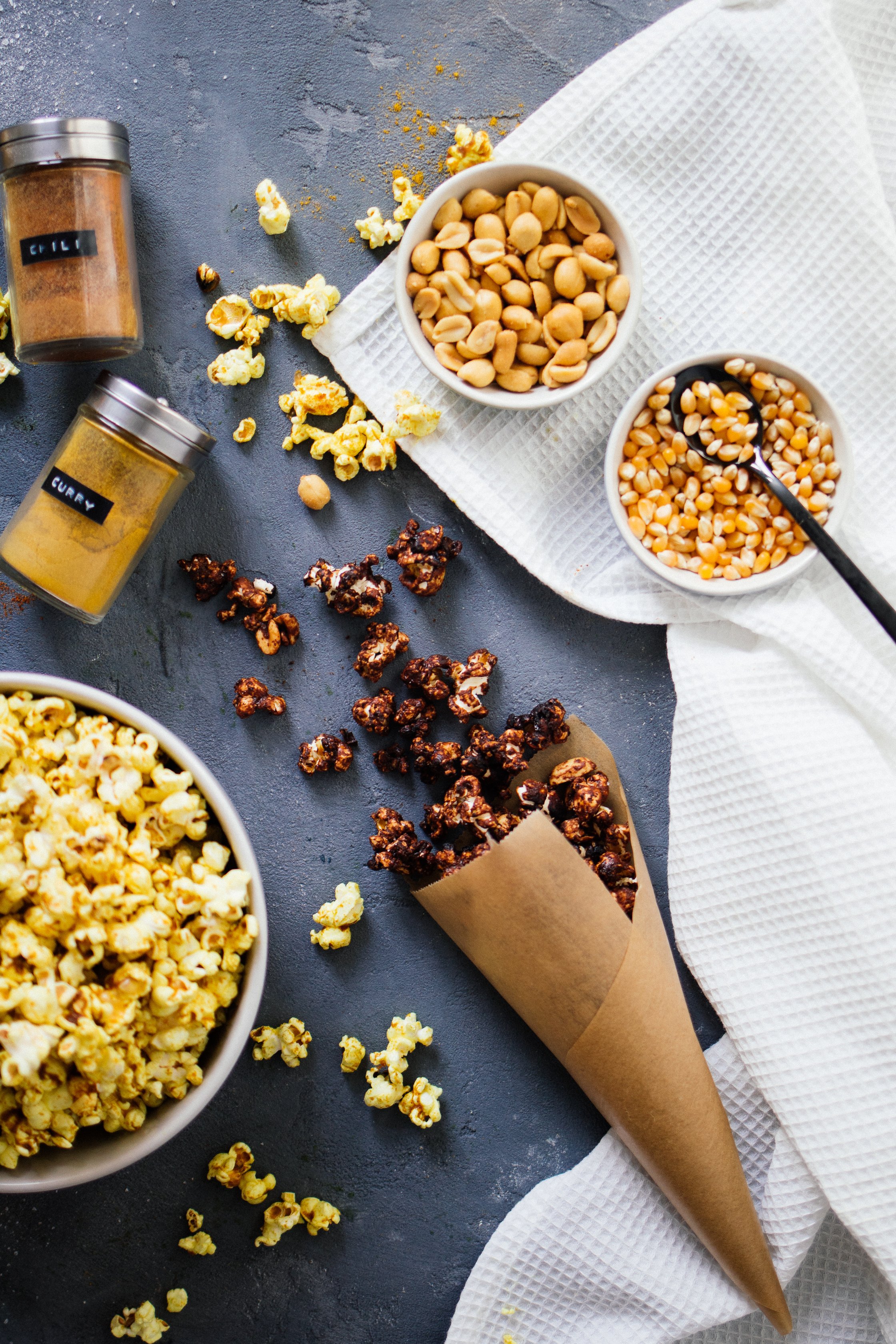 a bag of popcorn next to spices