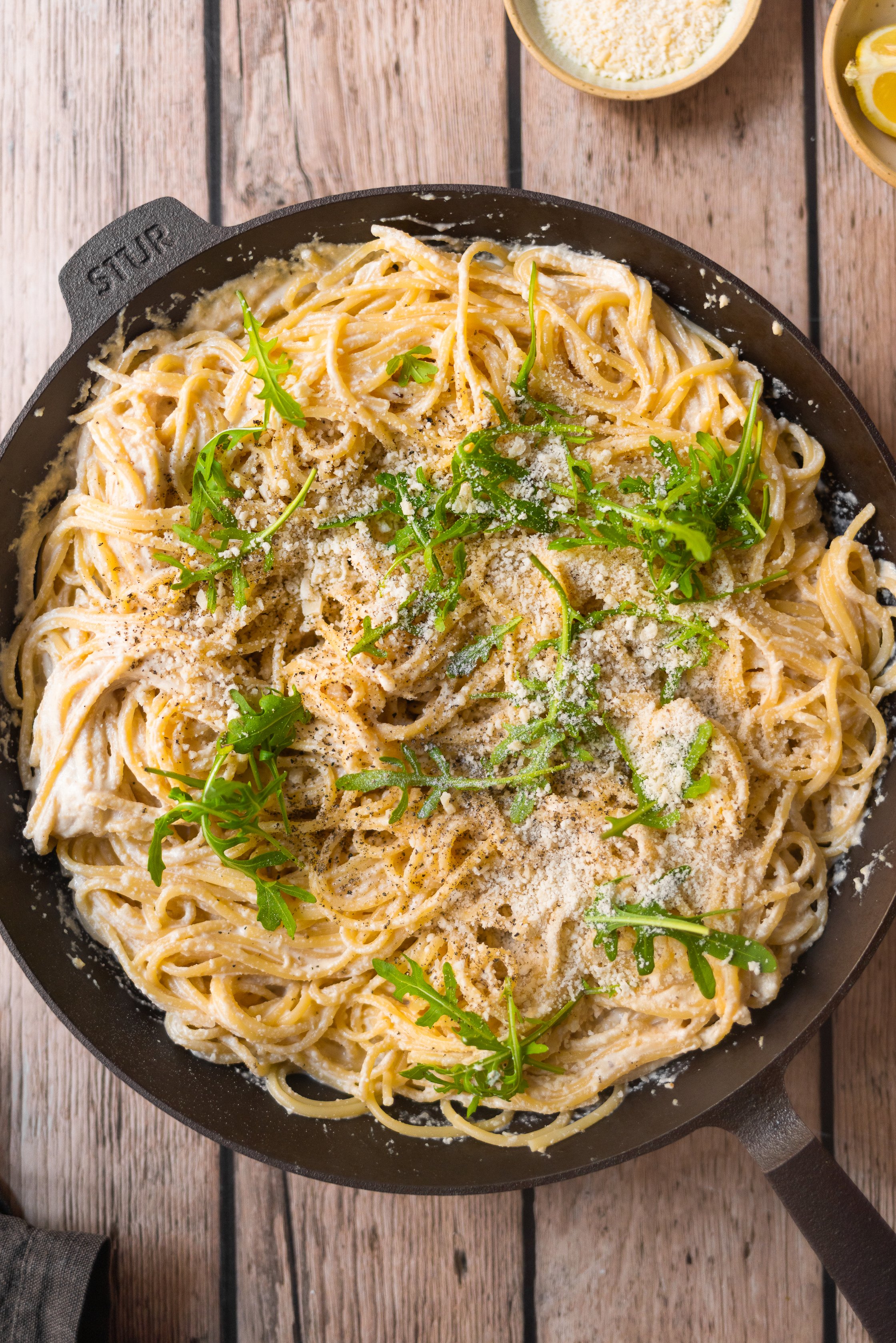 vegan pasta cacio e pepe in a pan