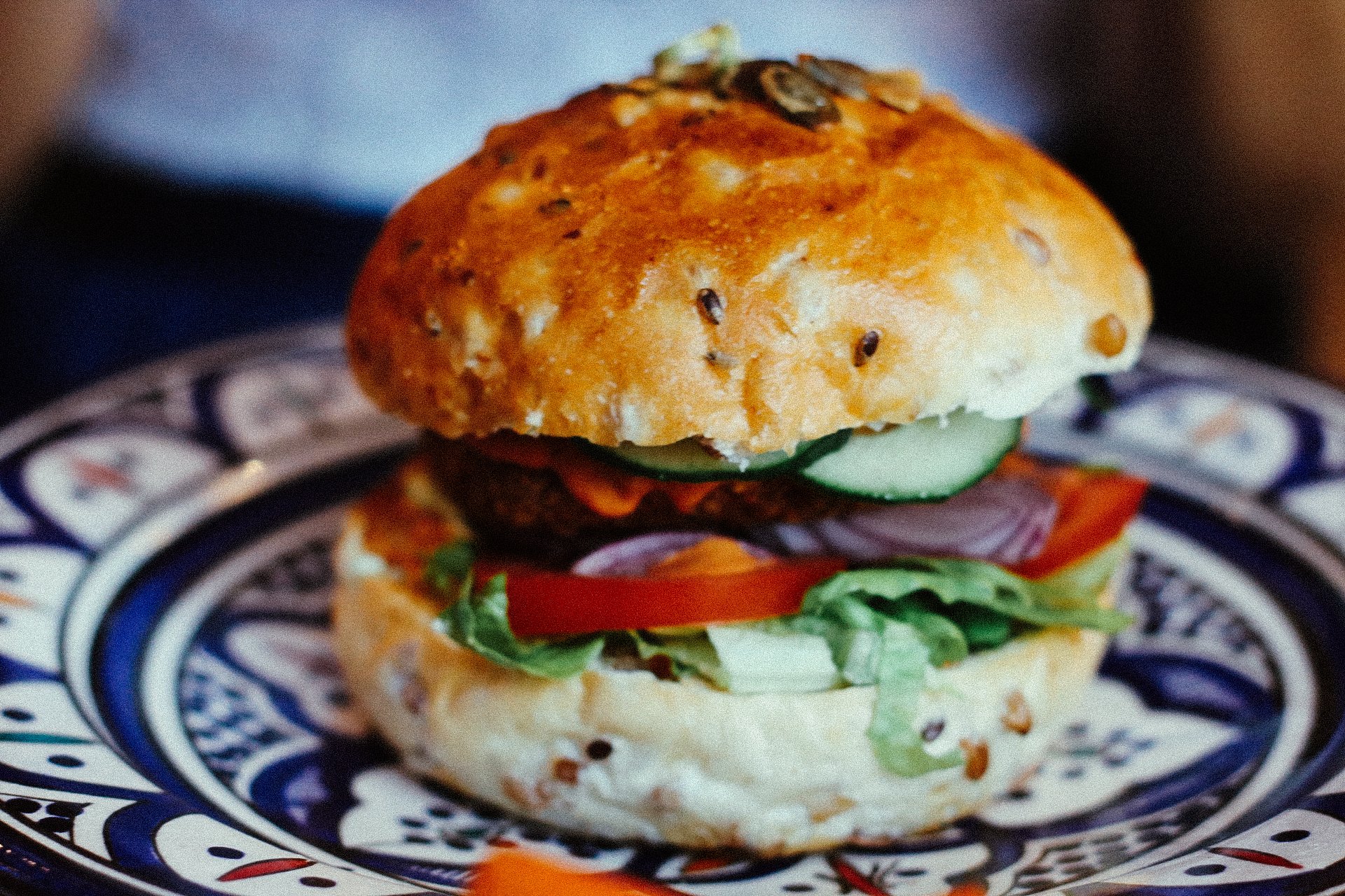 a burger on a blue plate