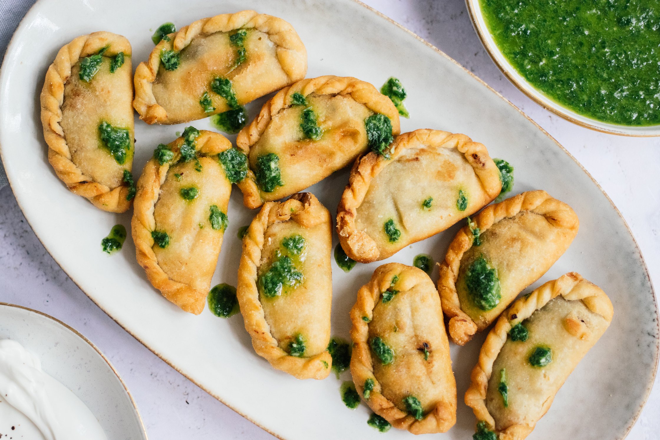 vegan empanadas with green sauce
