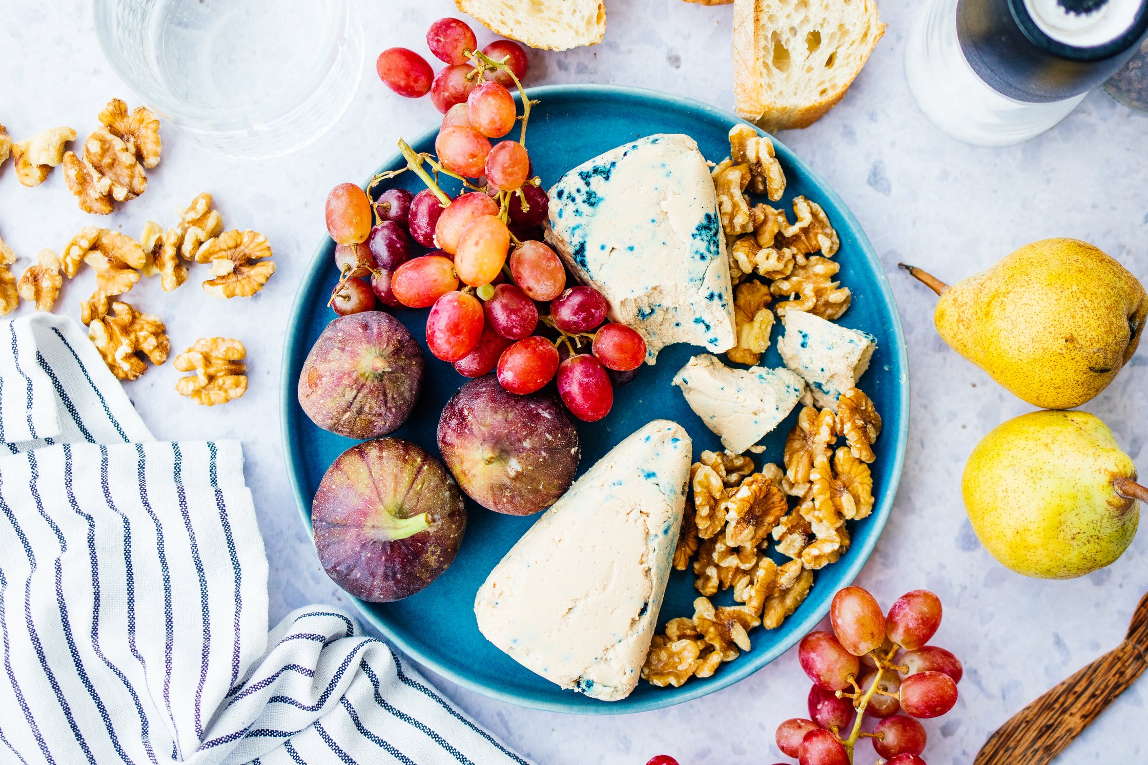 vegan blue cheese served with grapes and bread