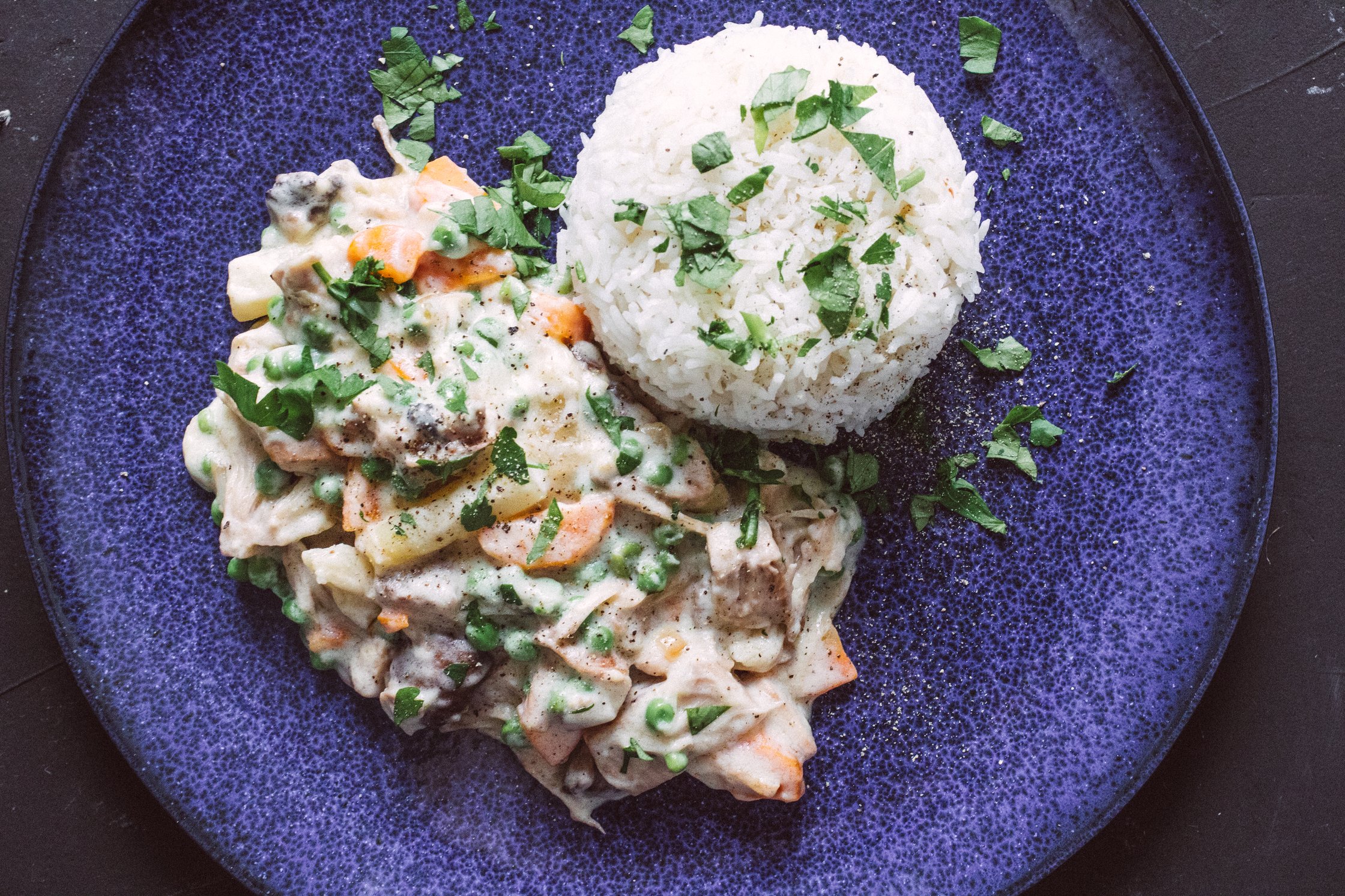 Jackfruit fricassee with rice served on plate