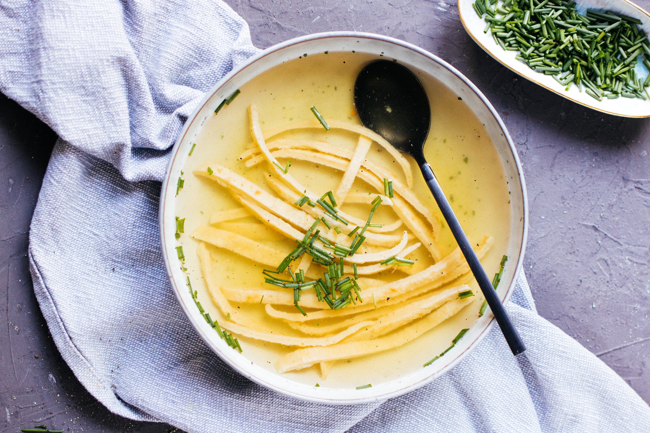 vegan flaedle soup in a bowl