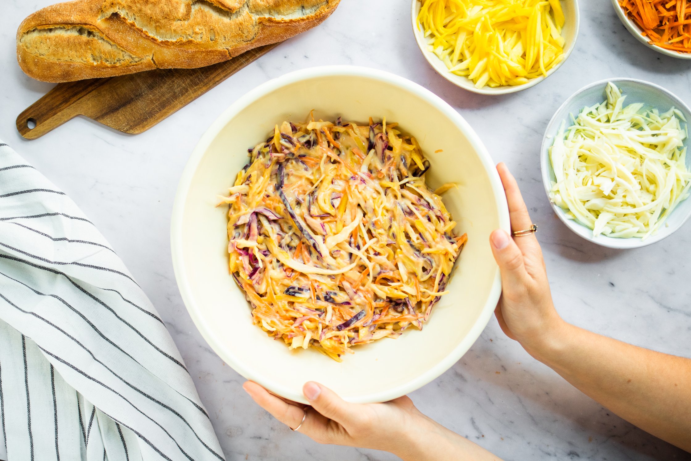 Vegan Mango Coleslaw in a Bowl, Baguette on a Board