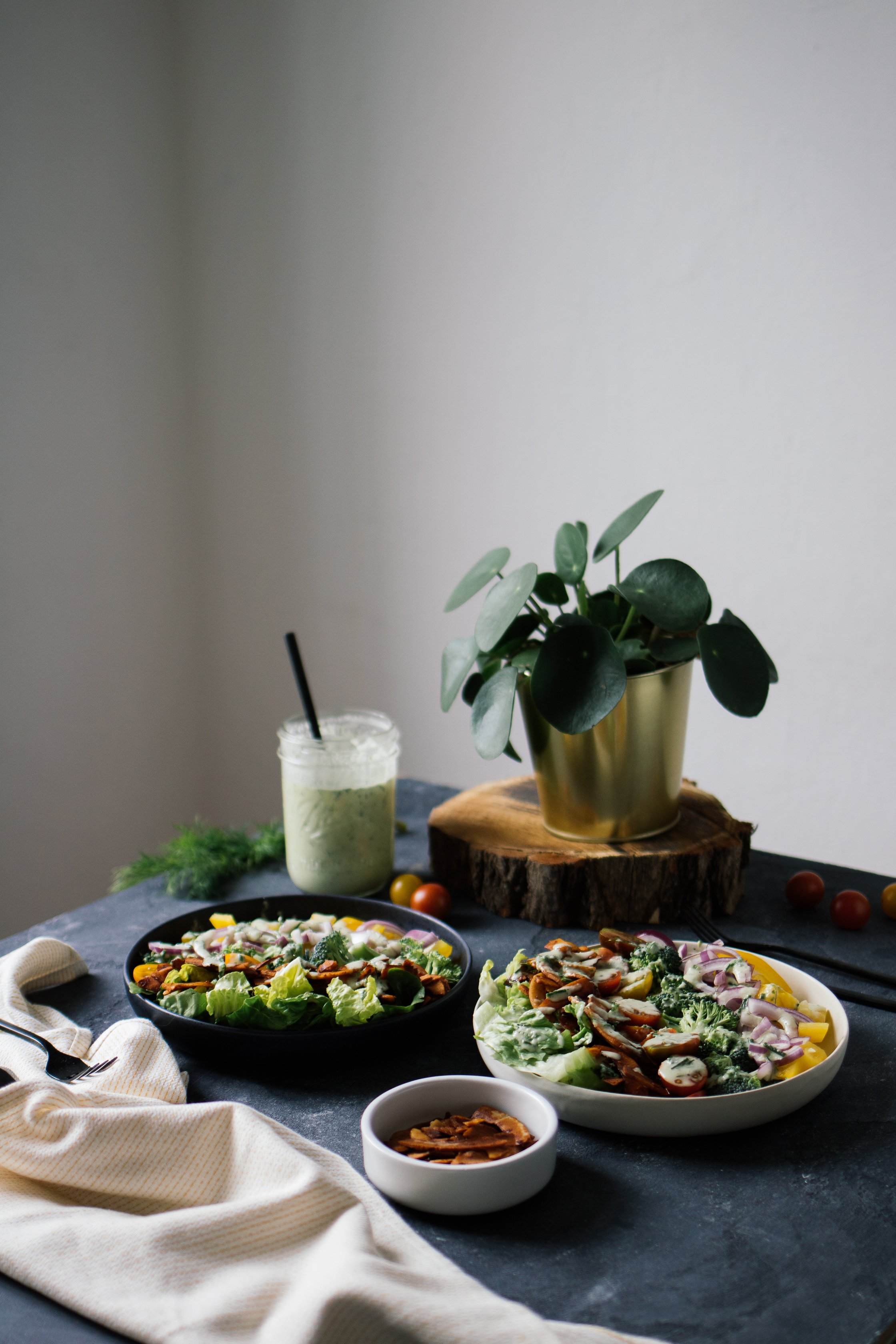 two big plates with salad