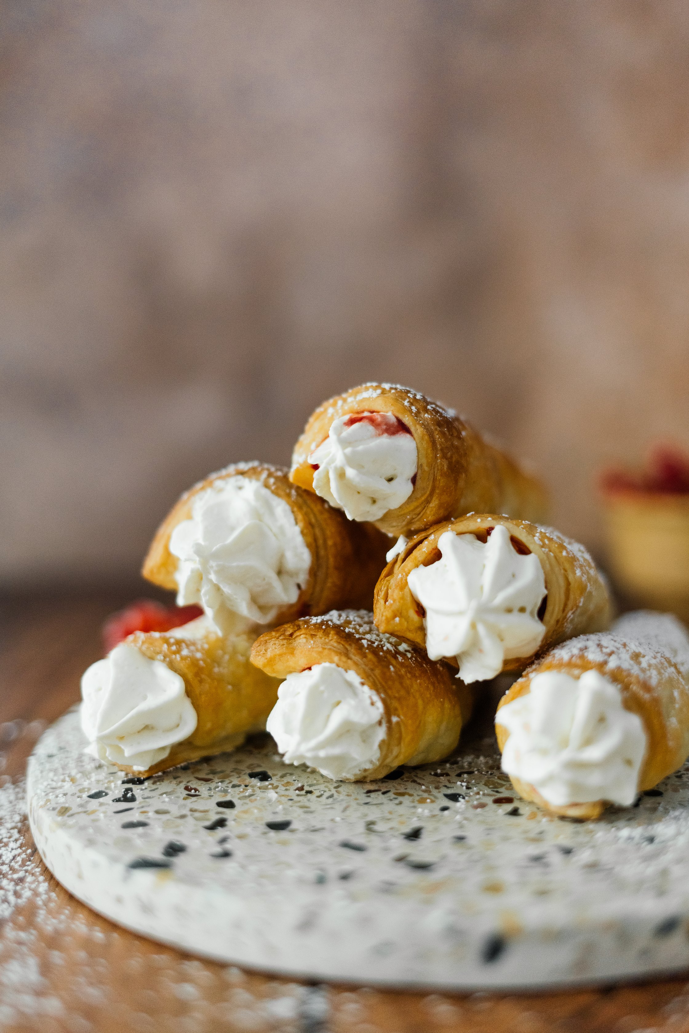 sweet vegan puff pastry rolls with red currants and cream