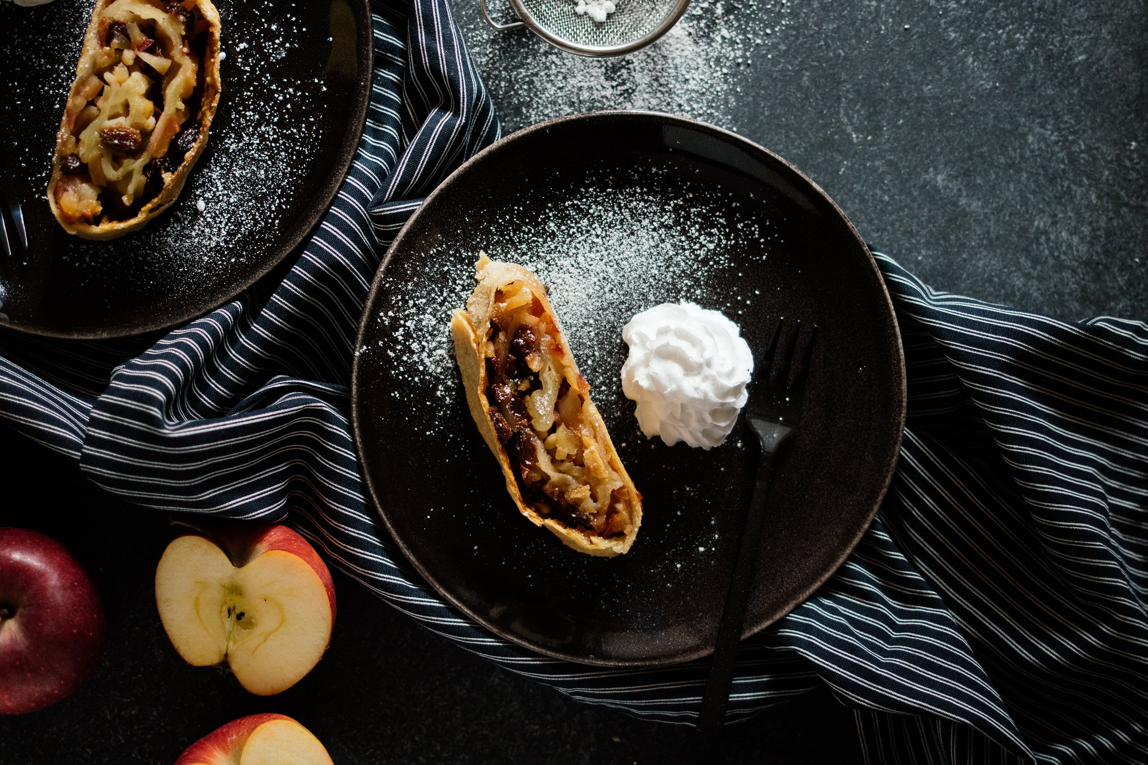 a vegan apple strudel with whipped cream