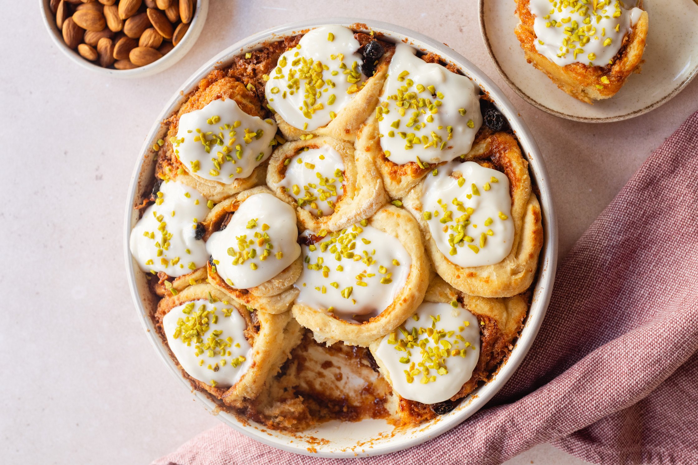 vegan carrot cake cinnamon buns decorated in a round mold