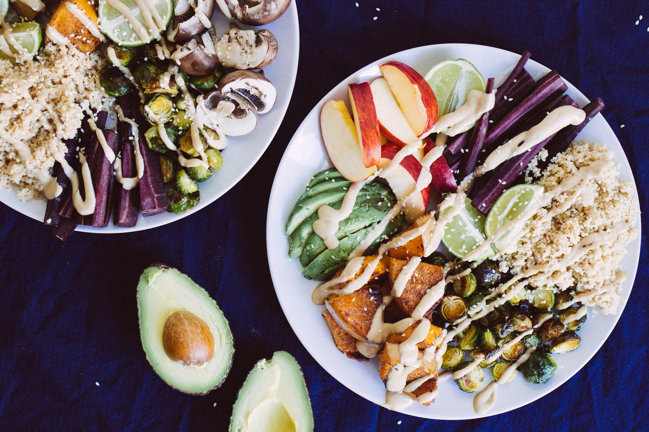 Vegan Couscous Bowl with brussels sprouts next to an avocado