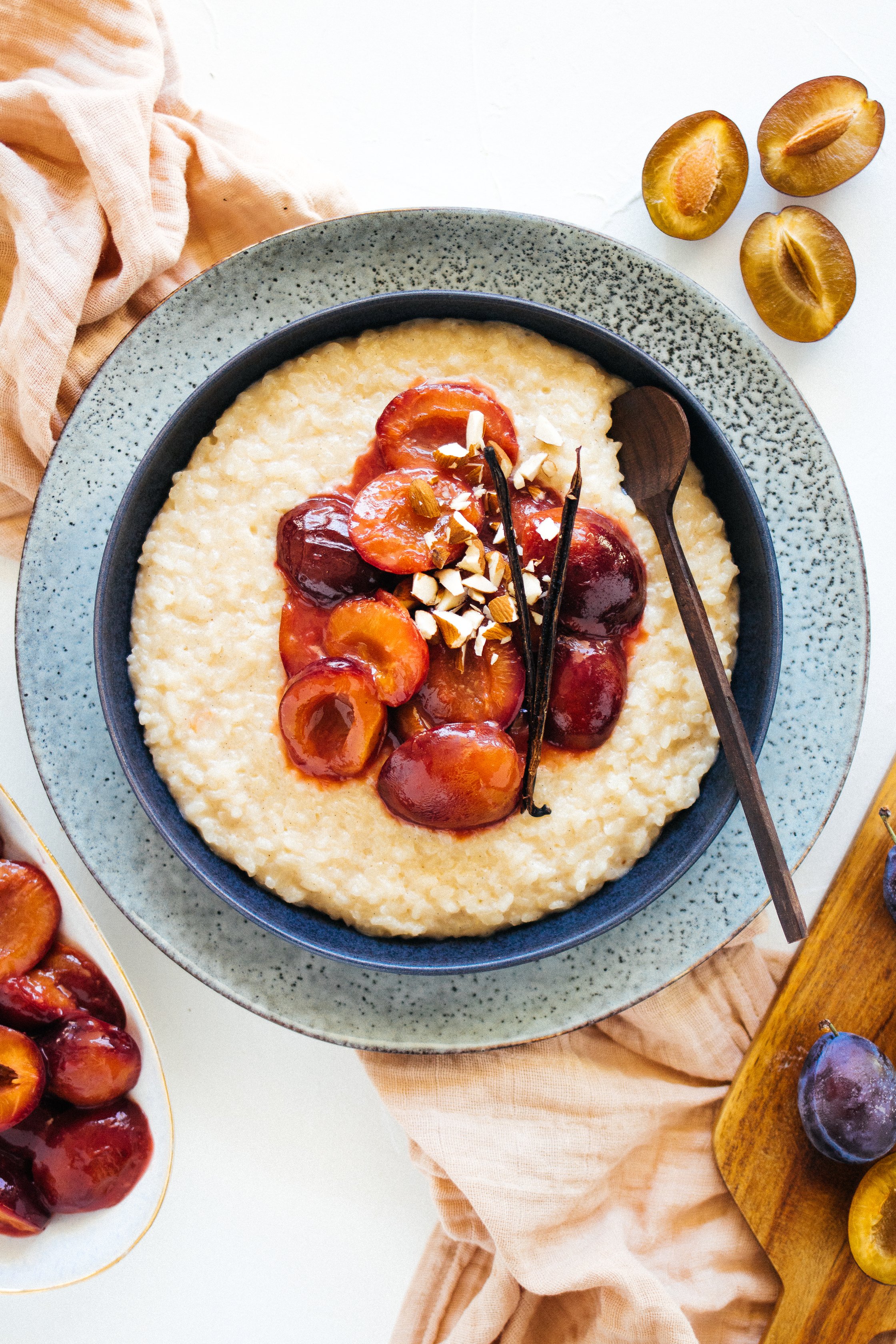 vegan rice pudding with plums and vanilla