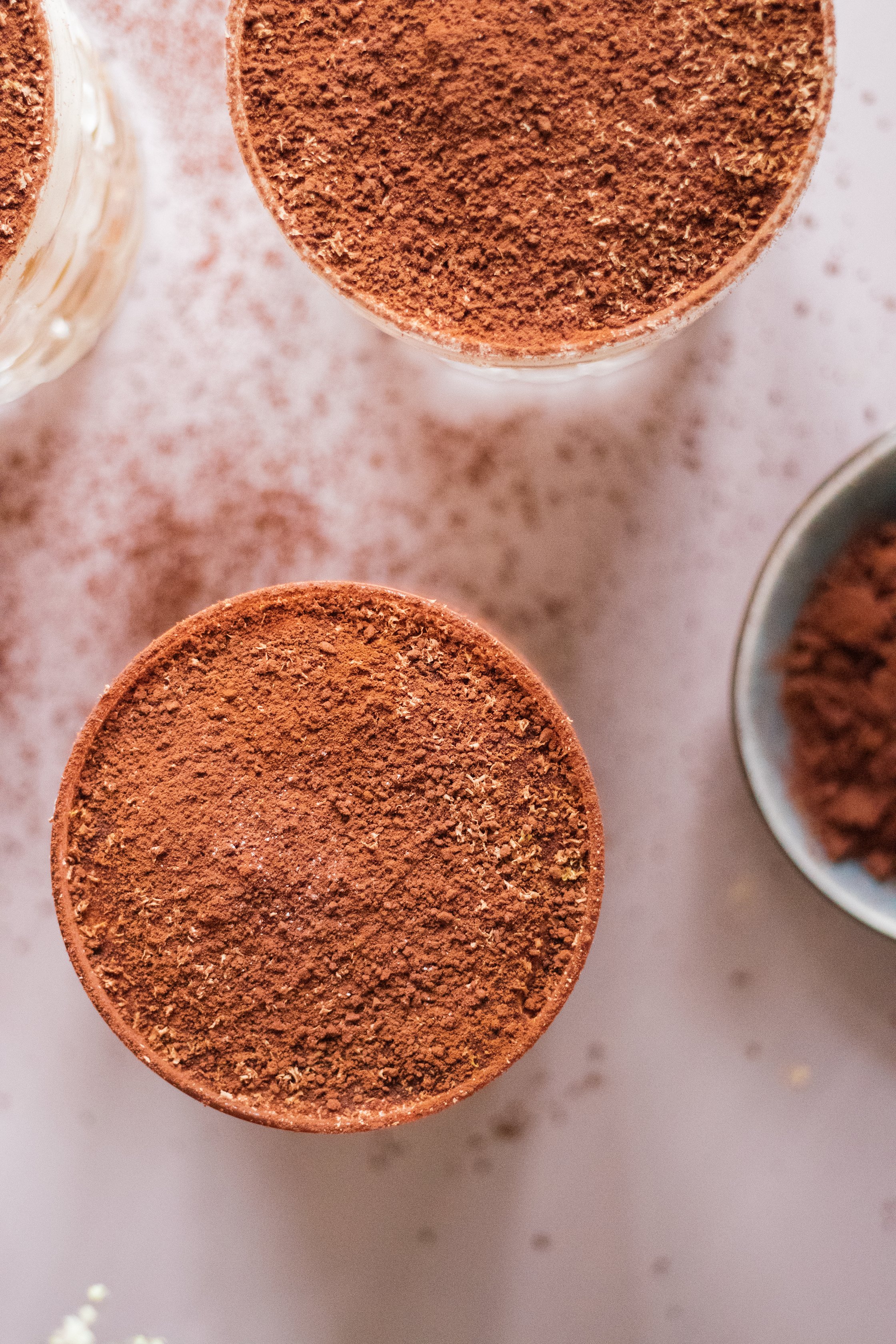 topshot of vegan tiramisu with cocoa