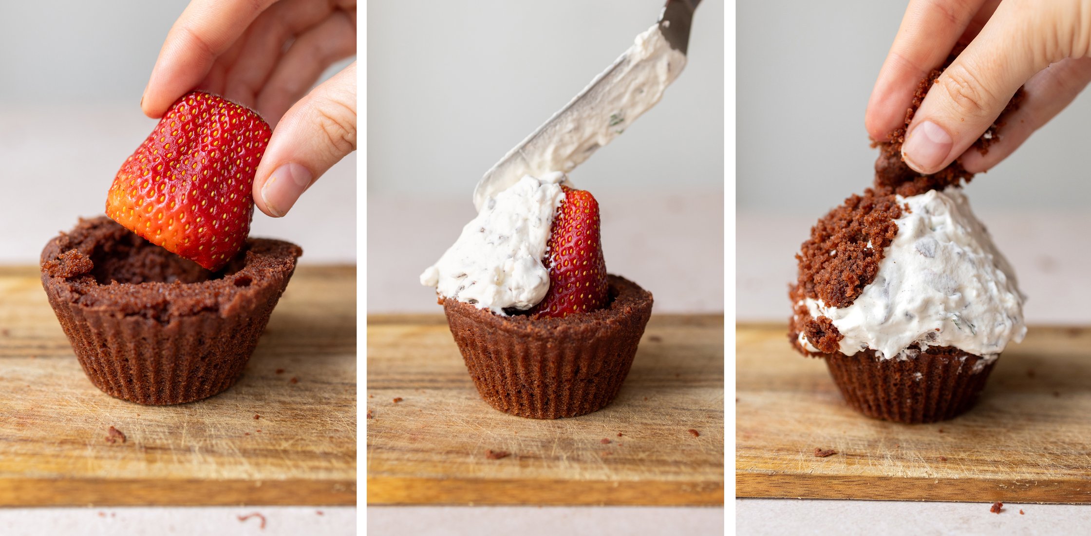 sahnecreme auf schokoladenmuffin mit erdbeere verstreichen