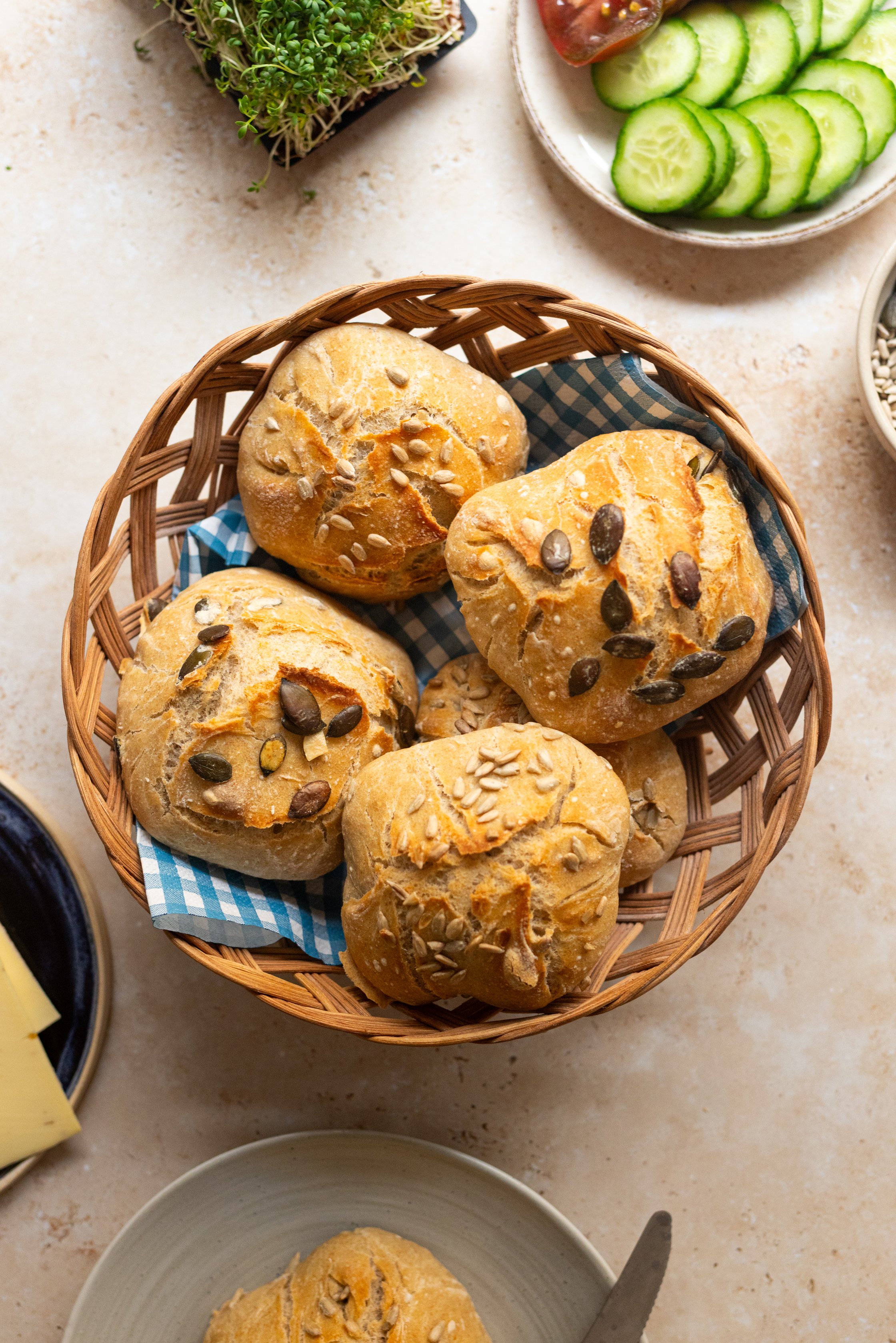 Homemade Sunday rolls in a bread basket, Topshot