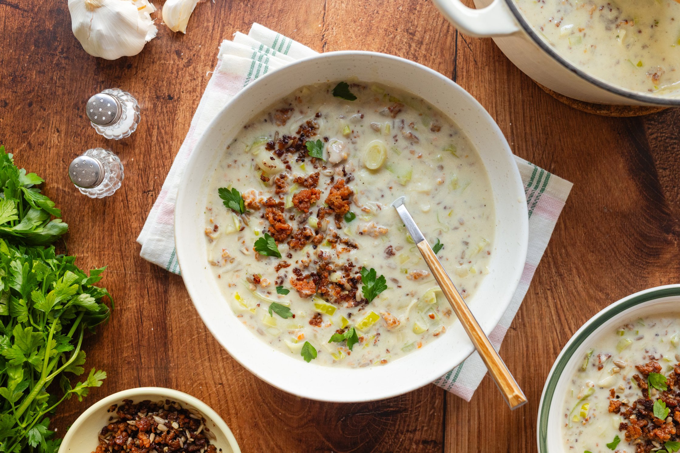 vegan creamy leek soup with vegan mince meat in a bowl