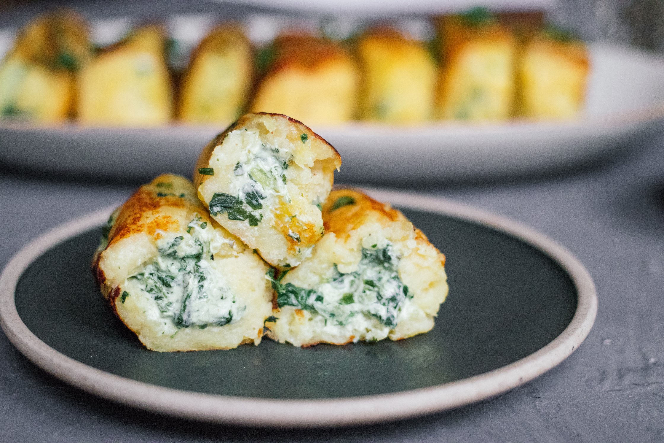 vegan potato cakes halved to see the filling