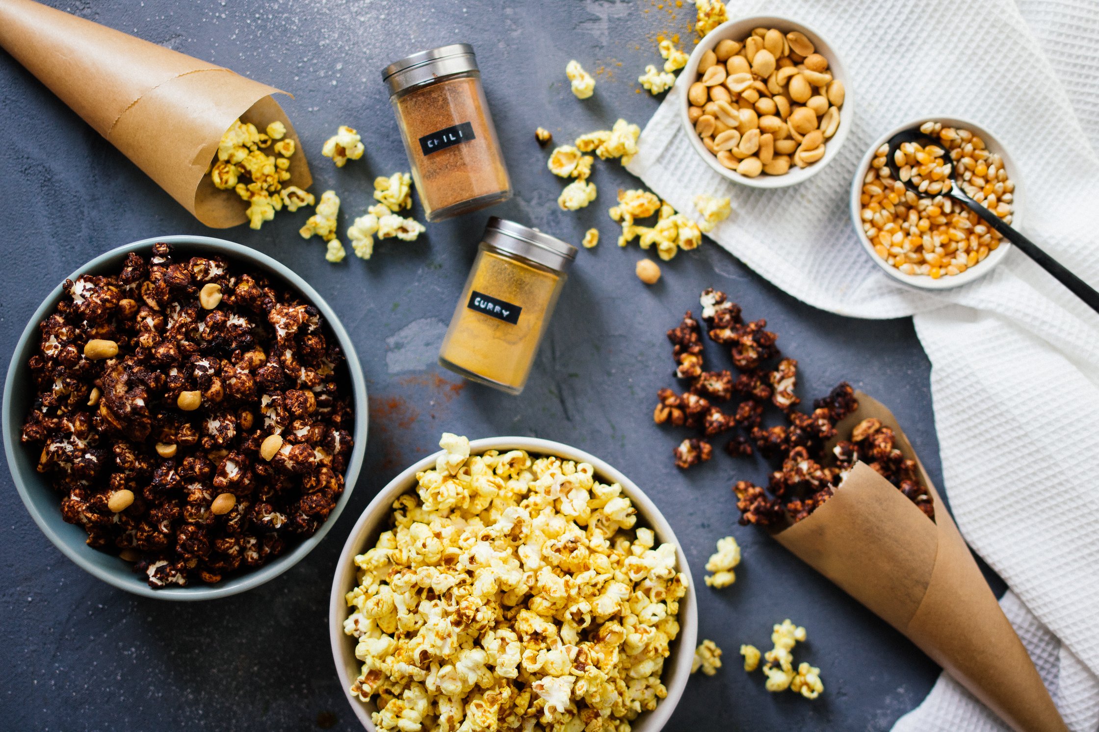 chocolate and curry popcorn in bowls